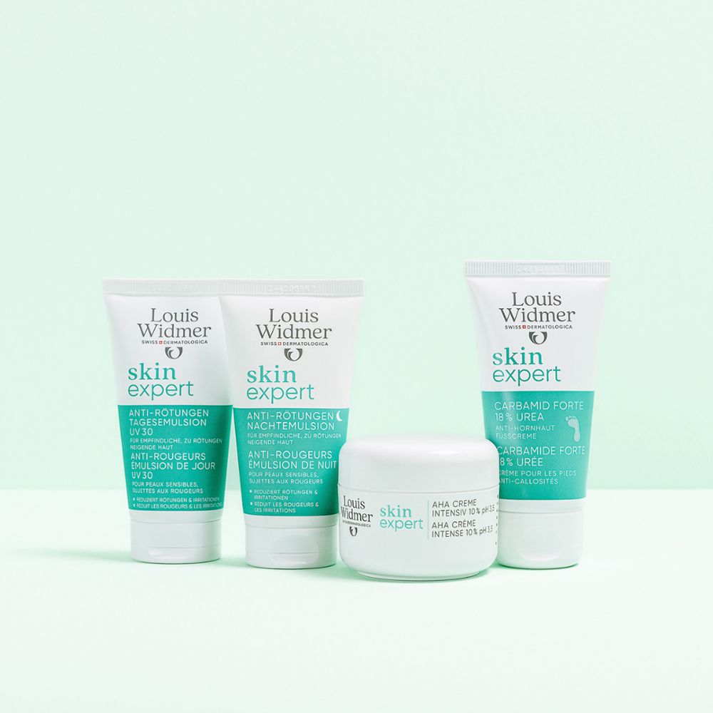 Vier Louis Widmer skin expert Produkte, darunter Nachtemulsion