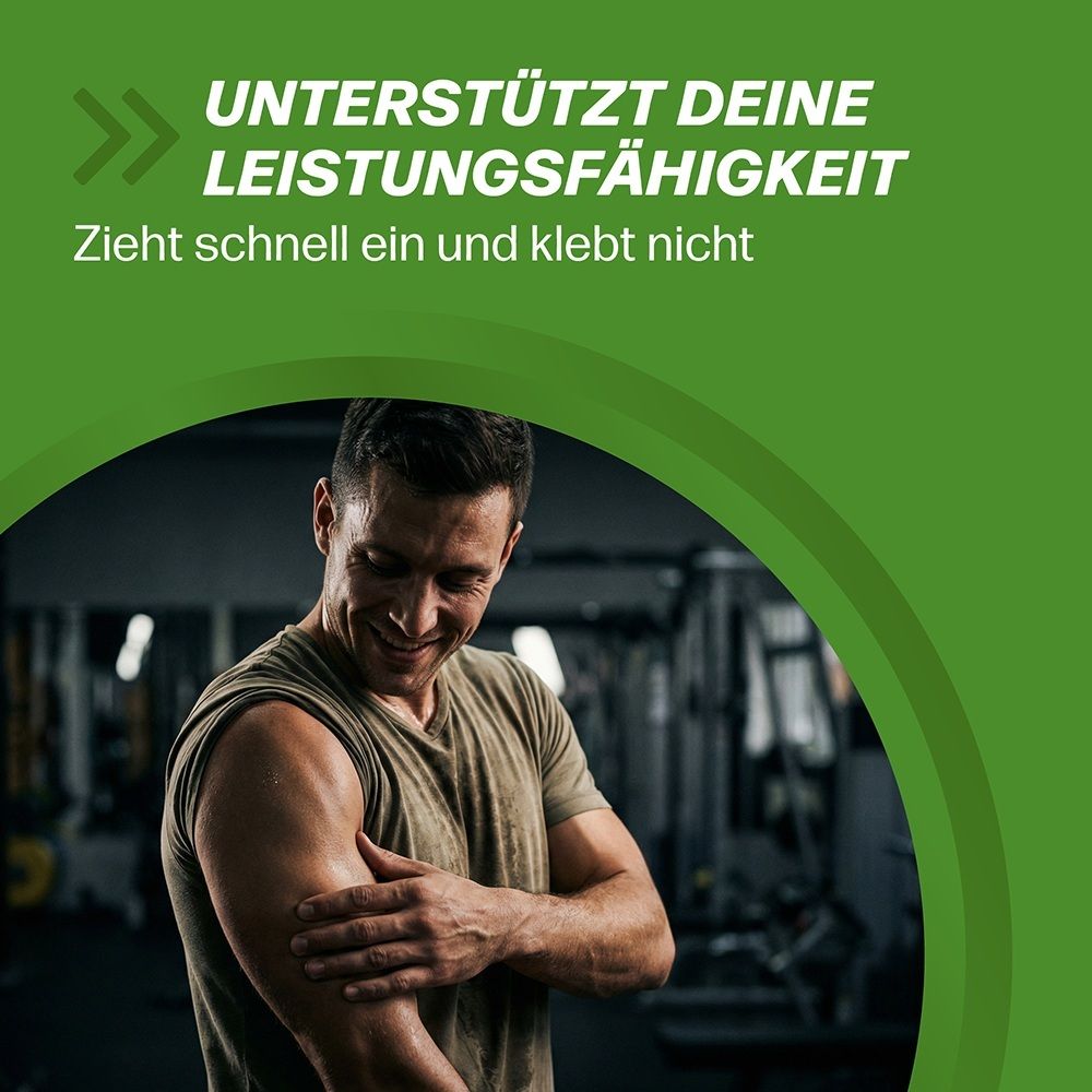Mann im Fitnessstudio, der seinen Bizeps berührt. Text: "Unterstützt deine Leistungsfähigkeit. Zieht schnell ein."