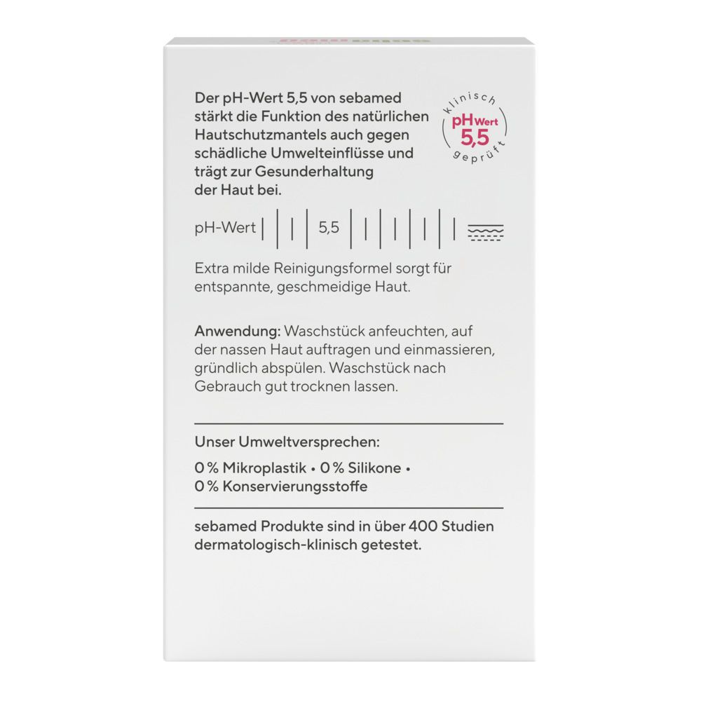 Rückseite des weißen Kartons. Text über pH-Wert 5,5, Anwendung und Umweltversprechen. Dermatologisch getestet.