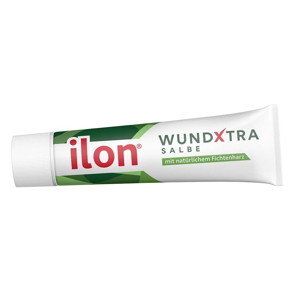 Weiße Tube ilon® WUNDXTRA Salbe. Text: WUNDXTRA Salbe, mit natürlichem Fichtenharz. Grüner und roter Aufdruck.