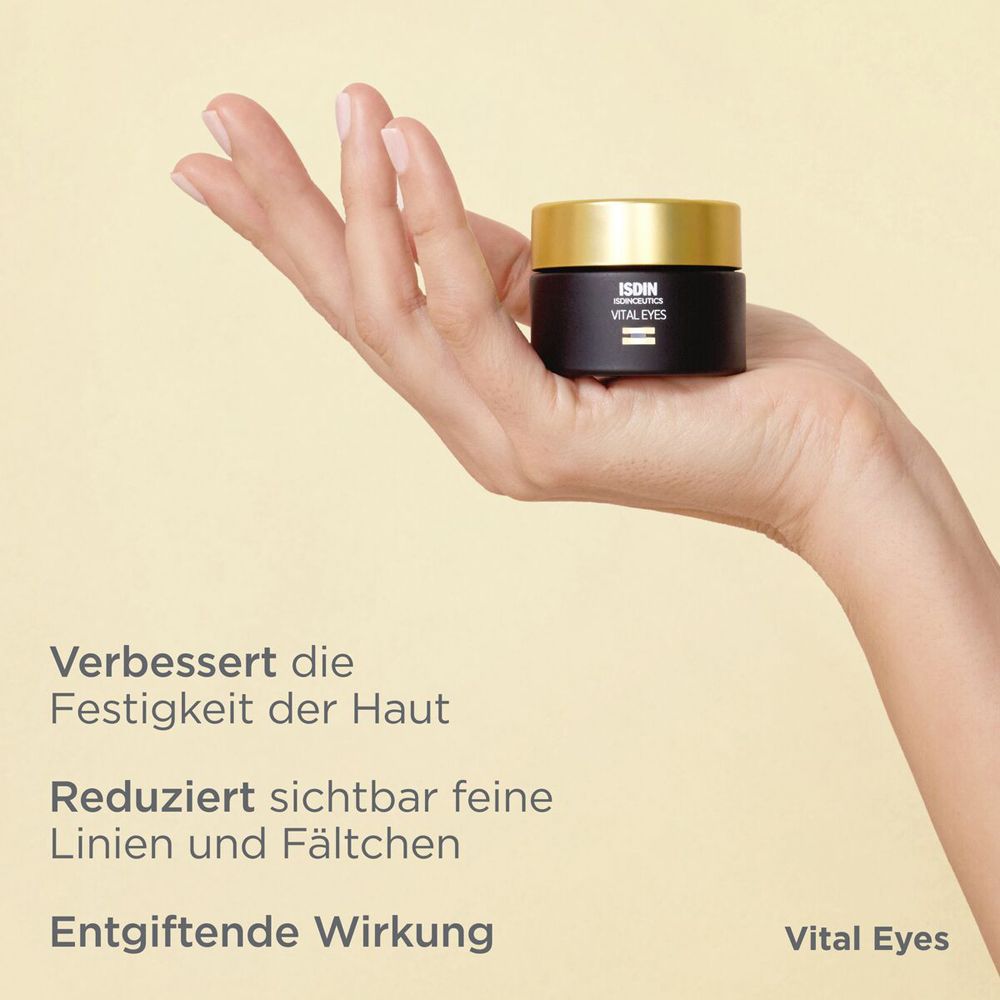 Hand hält einen schwarzen Tiegel mit goldfarbenem Deckel. Text: Vital Eyes. Verbessert die Hautfestigkeit.