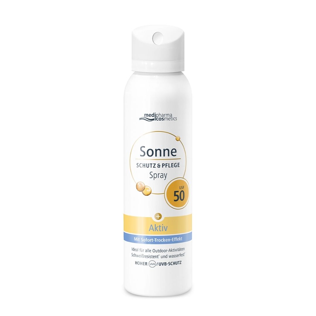 Sonne Schutz & Pflege Aktiv Aerosol-Spray LSF 50. Weiße Flasche mit Sprühkopf. Gelb-blaue Etikett. Marke sichtbar.