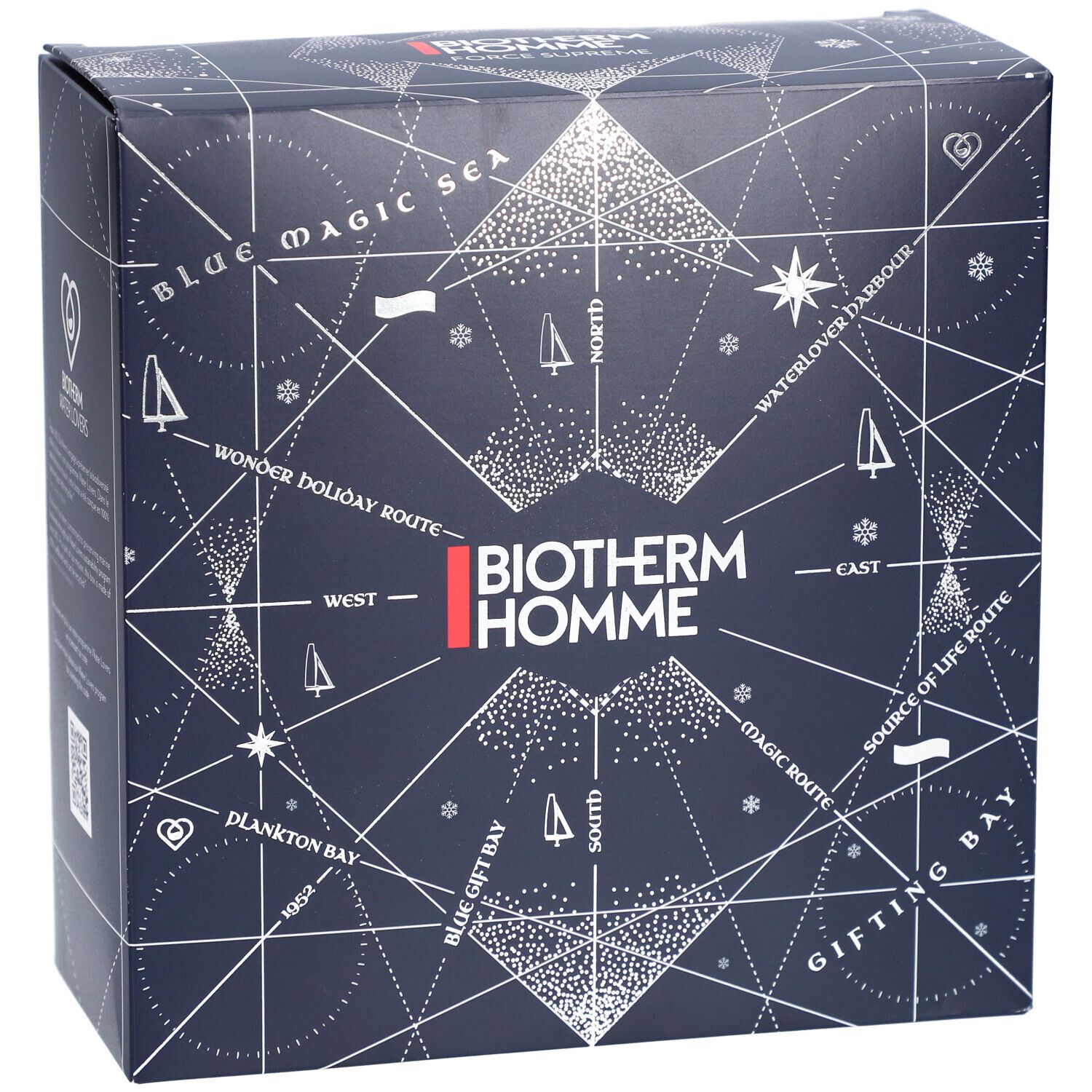 Dunkelblaue Geschenkbox mit weißem geometrischen Muster und dem Logo Biotherm Homme. Text: Blue Magic Sea, Wonder Holiday Route.