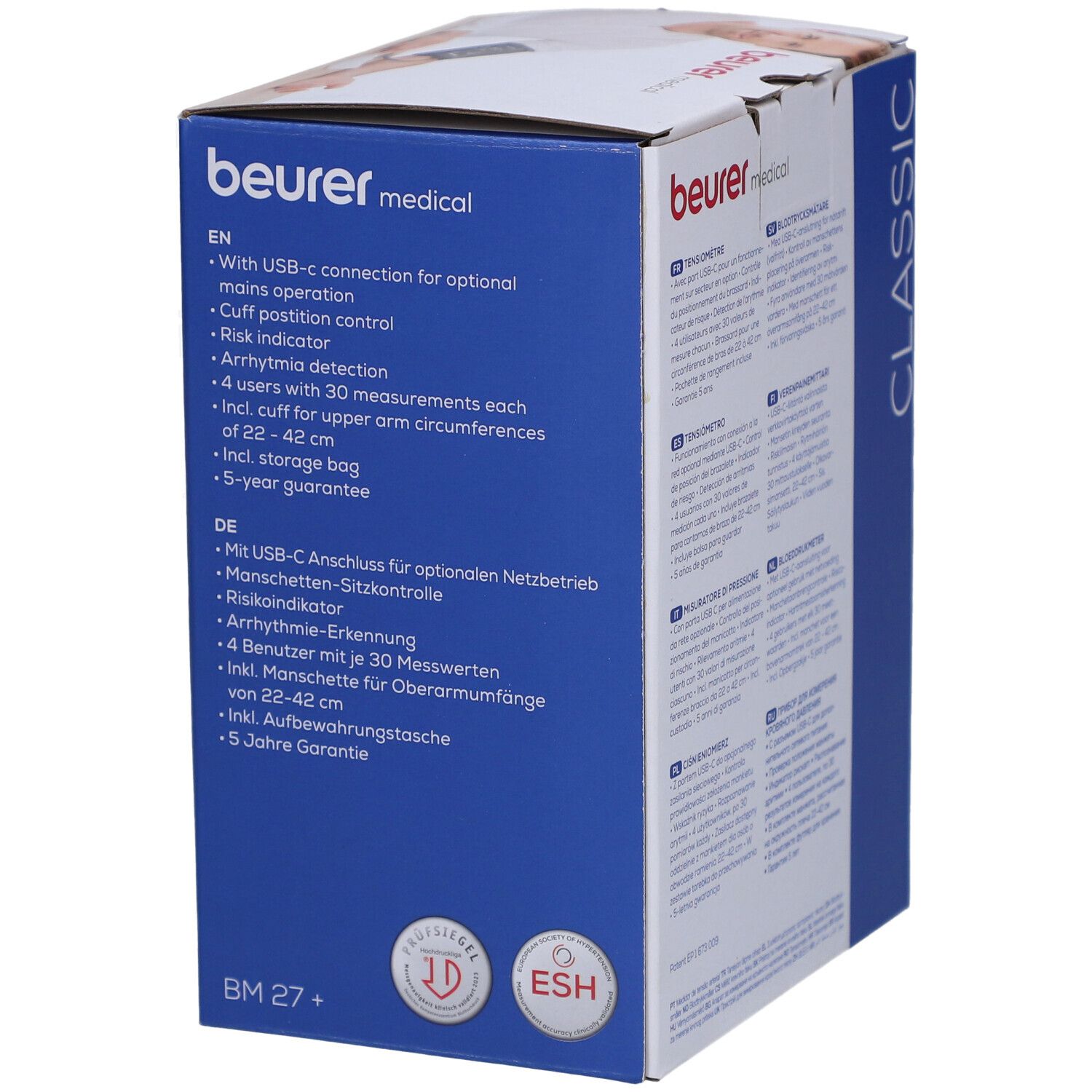 Verpackung mit Text in mehreren Sprachen. Enthält Informationen zum Gerät. Logos: ESH, ID. Text: Beurer, BM 27+.