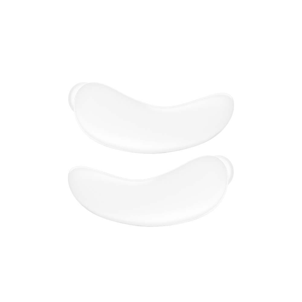 Zwei weiße, ovale Augen Pads. Sie sind leicht gebogen und haben eine kleine Aussparung an der Seite.