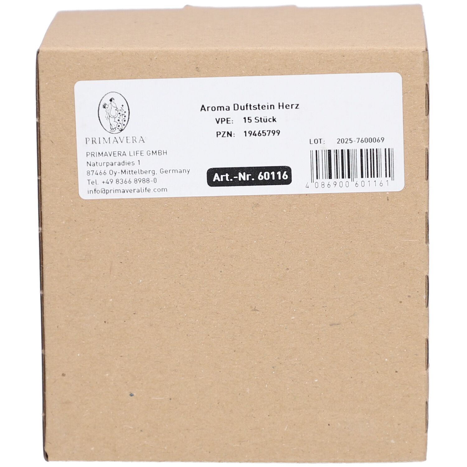 Herzförmiger, cremefarbener Stein. Glatte Oberfläche, abgerundete Form. Wellness-Produkt.