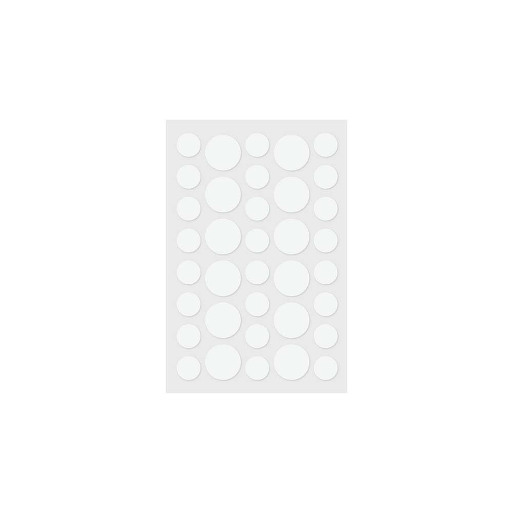 Blatt mit runden, transparenten Pickel Patches in verschiedenen Größen. Hydrokolloid-Pflaster.