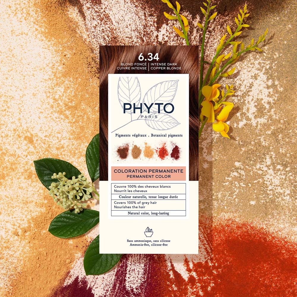 PHYTO PARIS Phytocolor 6.34. Produktverpackung mit Text und Pflanzen. Enthält pflanzliche Pigmente. Dekoration mit Blättern und Blüten.