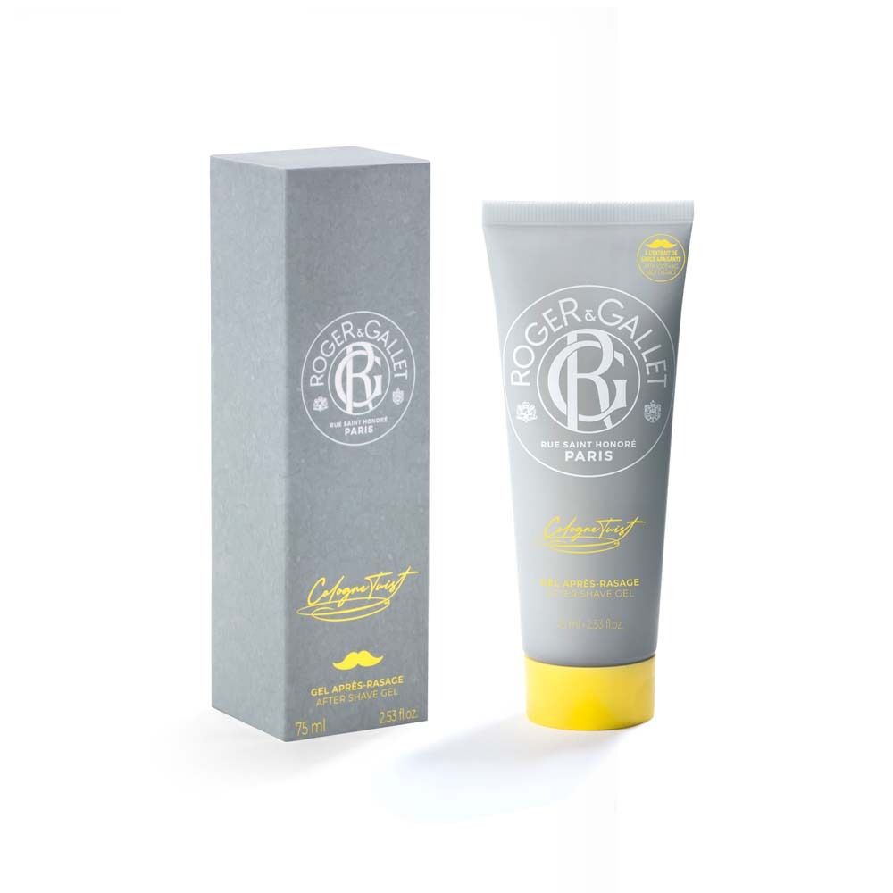 Graue Tube und Schachtel. Aufschrift ROGER&GALLET, Cologne Twist, Gel Après-Rasage. Gelber Schnurrbart. Weißer Hintergrund.