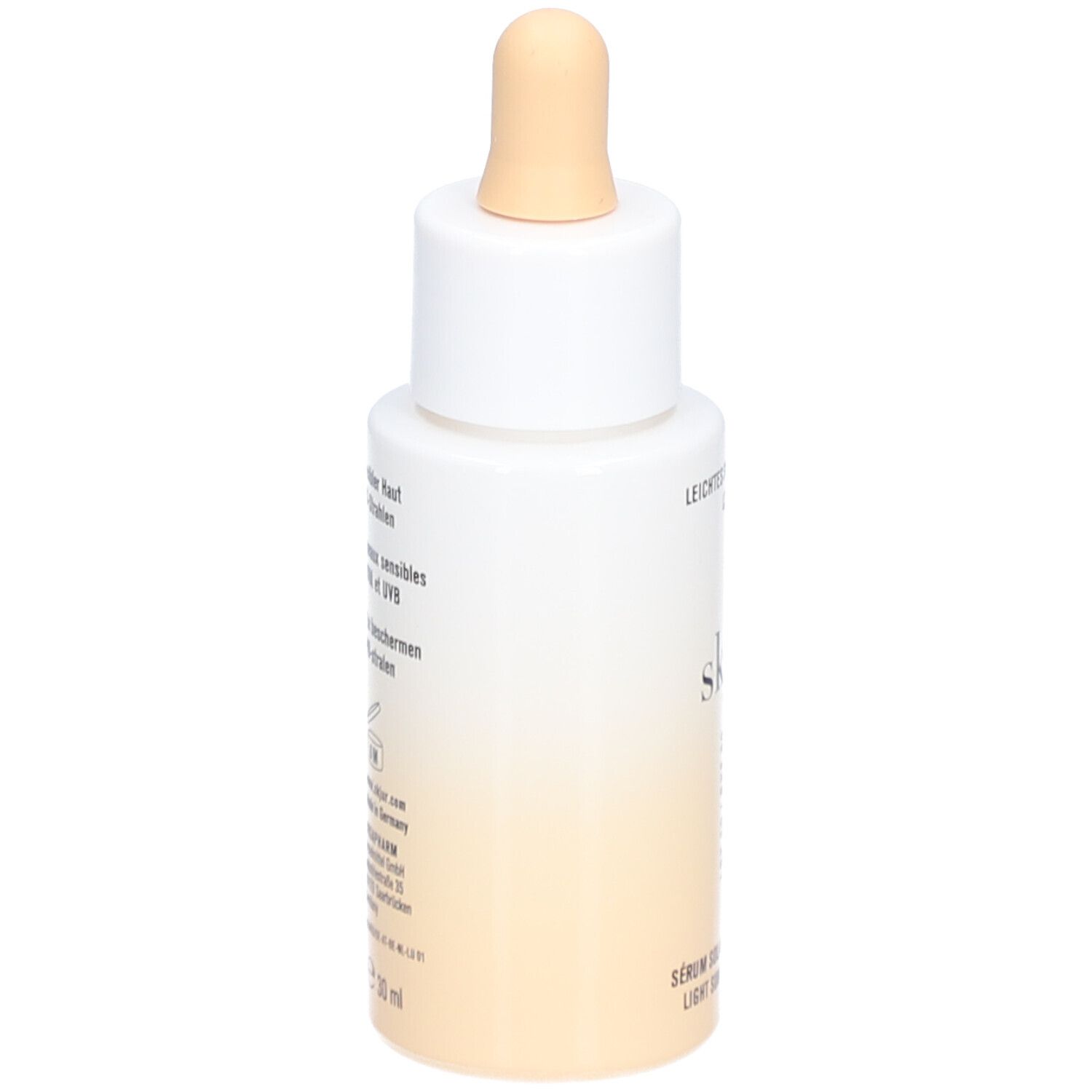 Rückansicht der Flasche. Aufschrift: Leichtes Sonnenserum LSF 50, skjur. Text für empfindliche Haut. 30 ml.
