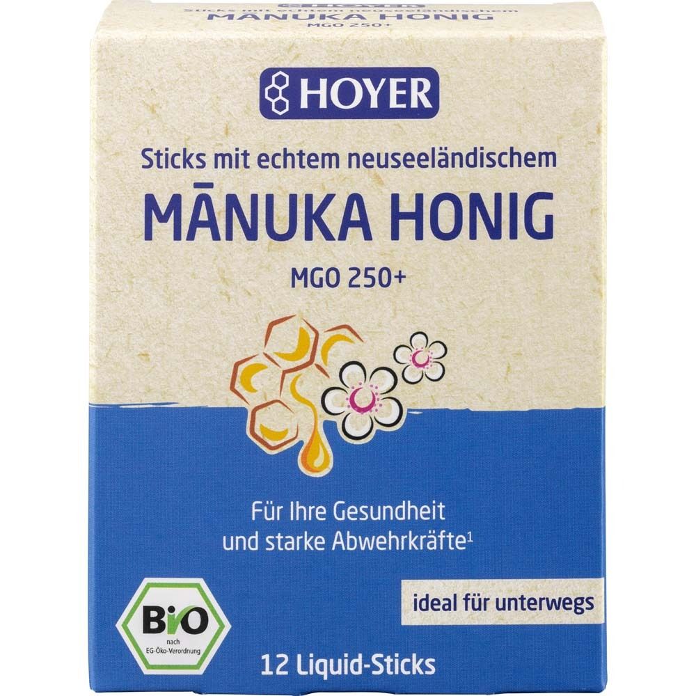 Karton mit HOYER Mānuka Honig. Blaue und cremefarbene Verpackung. Text: Mānuka Honig MGO 250+, 12 Liquid-Sticks.