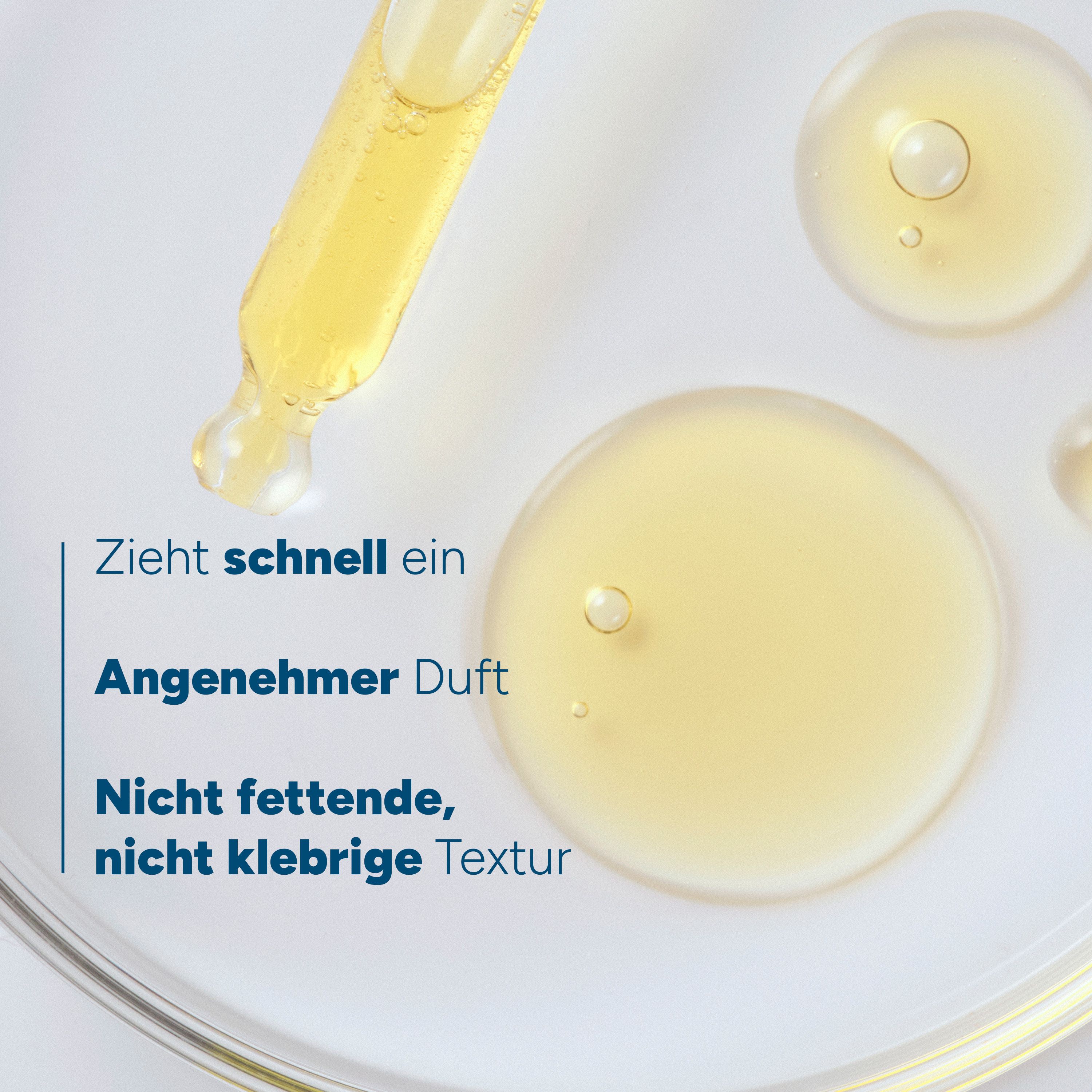 Flüssigkeit in Glasflasche mit Pipette. Text: Zieht schnell ein, Angenehmer Duft, Nicht fettende Textur.