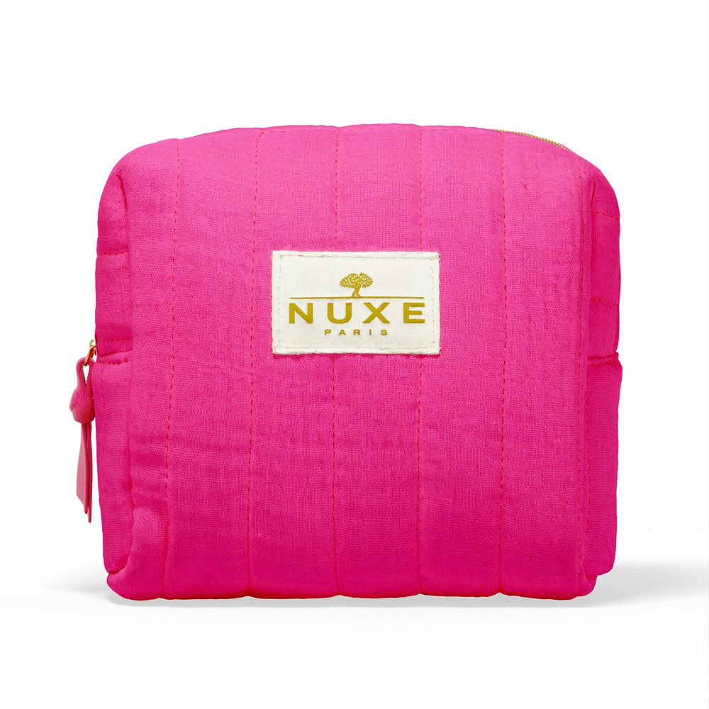 Pinkfarbene Kosmetiktasche mit Reißverschluss und Logo "NUXE PARIS".