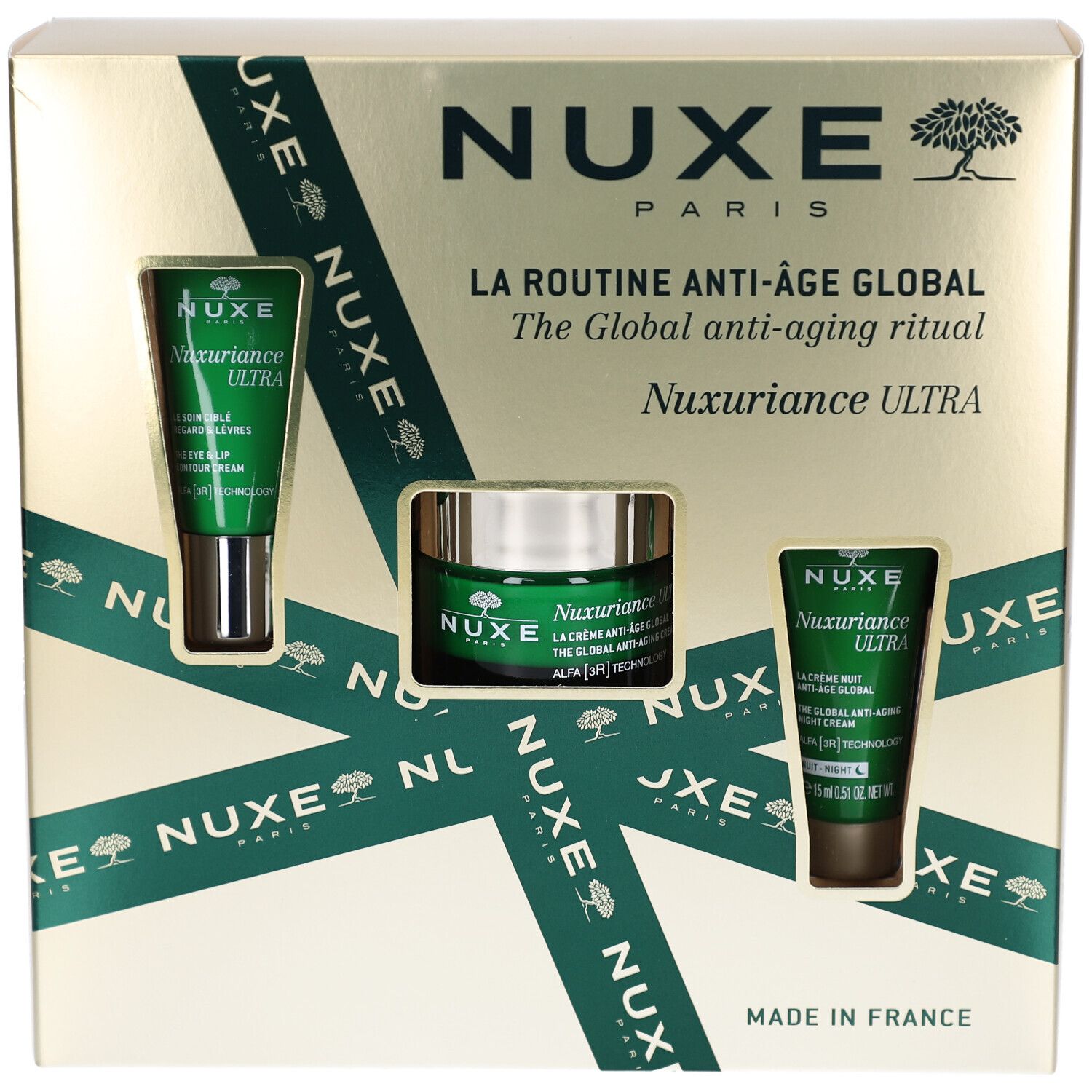 Geschenkbox mit drei NUXE-Produkten. Sichtbare Produkte: Augencreme, Creme und Gesichtscreme. Verpackung mit Logo und Text.