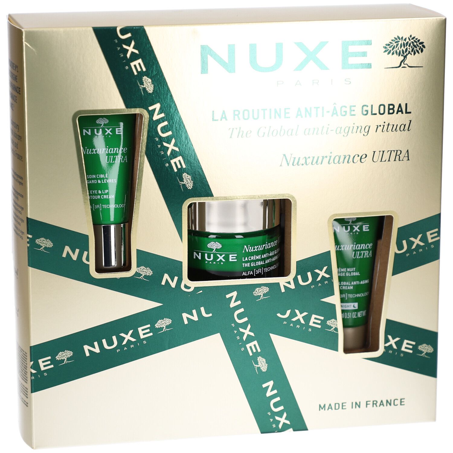 Geschenkbox mit drei NUXE-Produkten. Sichtbare Produkte: Augencreme, Creme und Gesichtscreme. Verpackung mit Logo und Text.