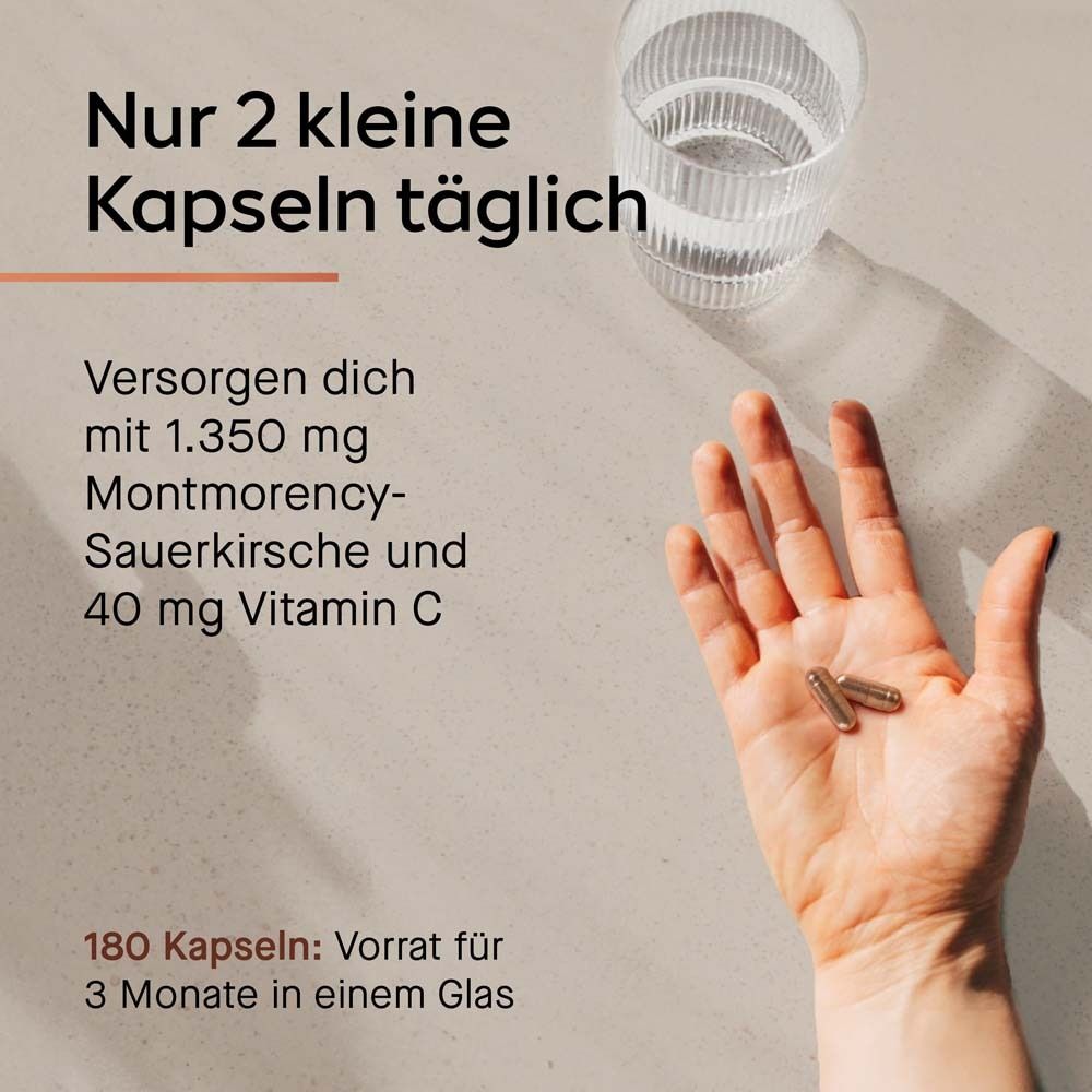 Hand mit zwei Kapseln. Text: "Nur 2 kleine Kapseln täglich". Glas Wasser daneben. 180 Kapseln.