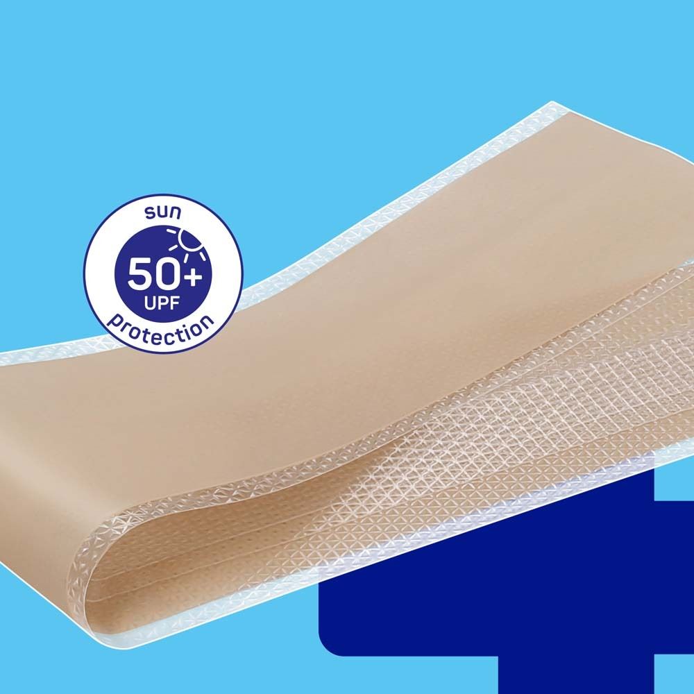 Beige Narbenpflaster mit 50+ UV-Schutz-Siegel. Oberseite strukturiert.
