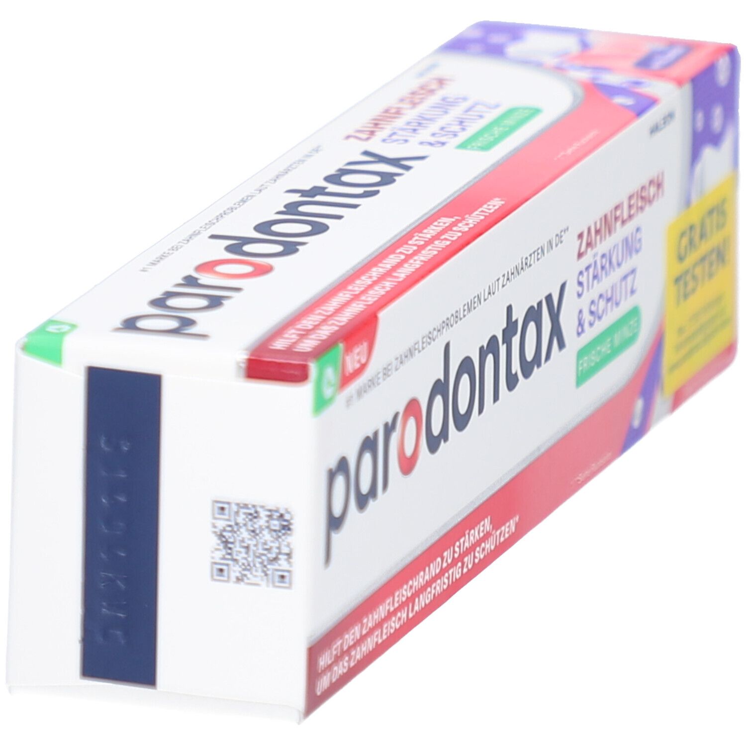 Zahnpasta-Verpackung, schräg von oben. Produktname und QR-Code auf der Verpackung sichtbar.