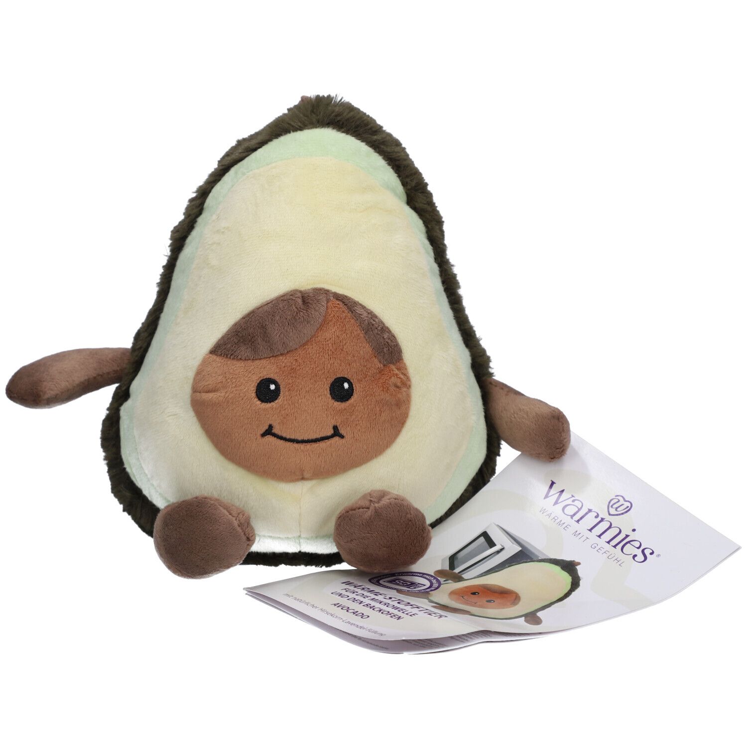 Plüsch-Avocado mit Gesicht und Gliedmaßen. Beiliegend ein Etikett mit dem Markennamen Warmies.