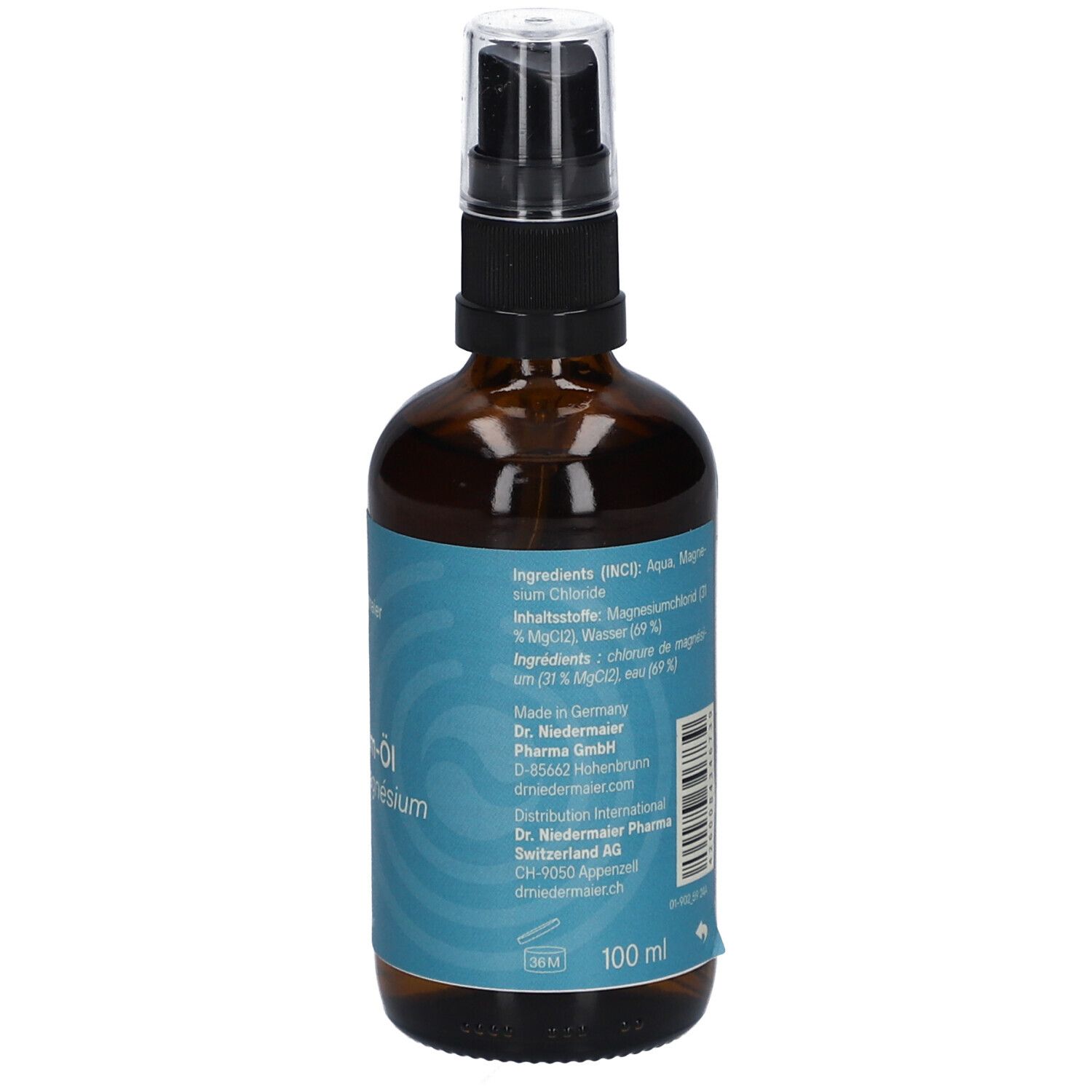 Braune Glasflasche mit Sprühkopf. Aufschrift: Magnesium-Öl, Dr. Niedermaier. Türkisfarbenes Etikett. 100 ml.