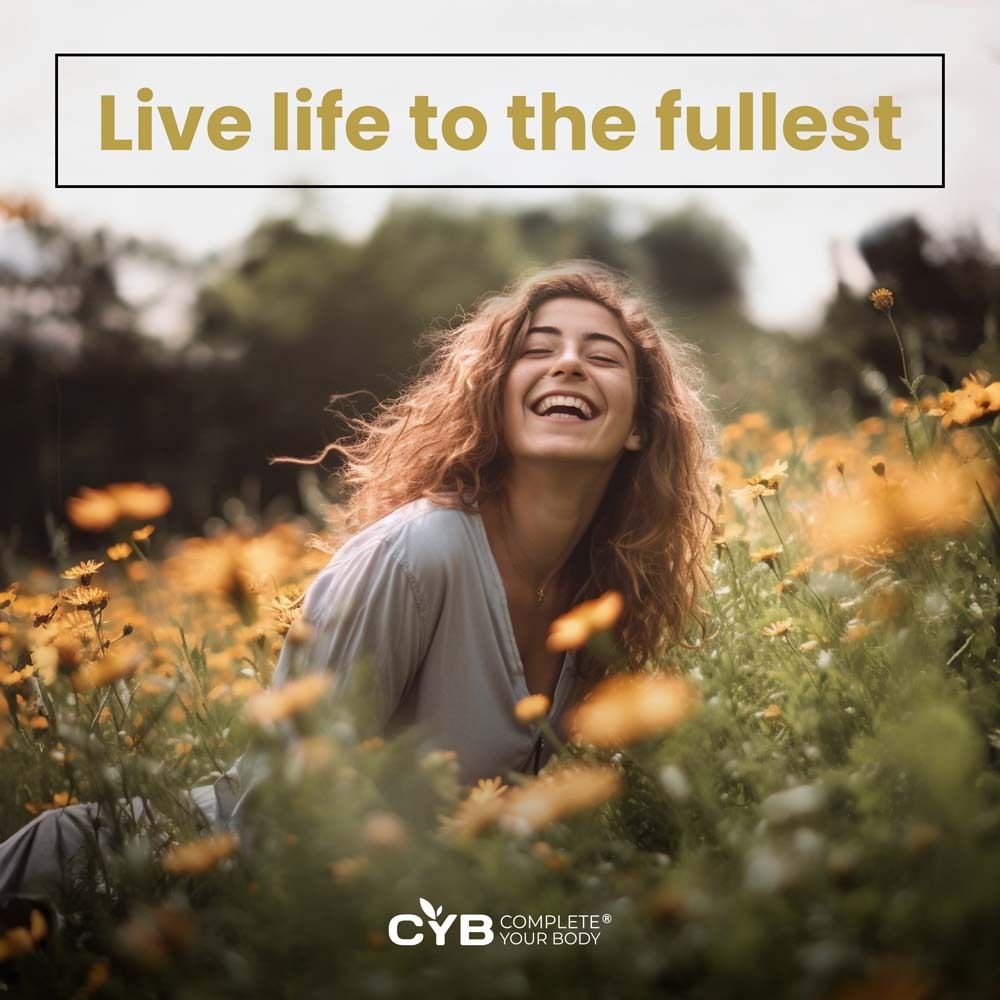 Frau in Blumenwiese. Text: Live life to the fullest. CYB Logo.