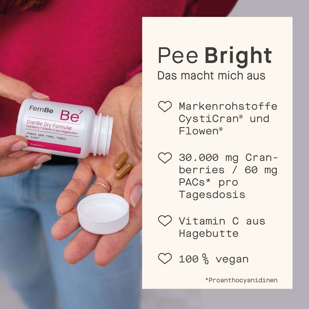Hand hält Flasche mit FemBe Be7 CranBe Dry Formular. Text: Pee Bright. 100% vegan.