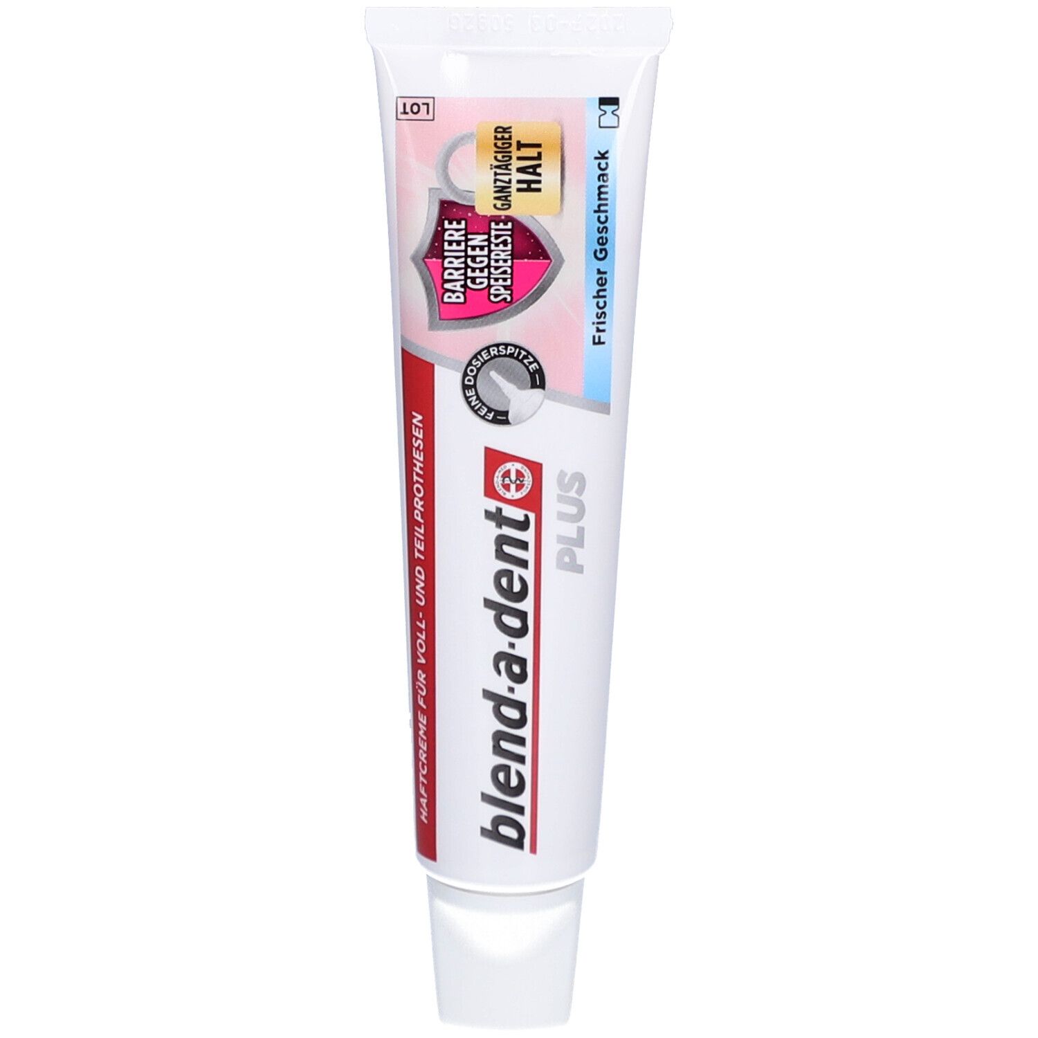 Zahnprothesen-Haftcreme-Tube. Marke: blend-a-dent PLUS. Weiß, mit farbigen Akzenten. Text: Barriere gegen Speisereste, ganztägiger Halt, frischer Geschmack.