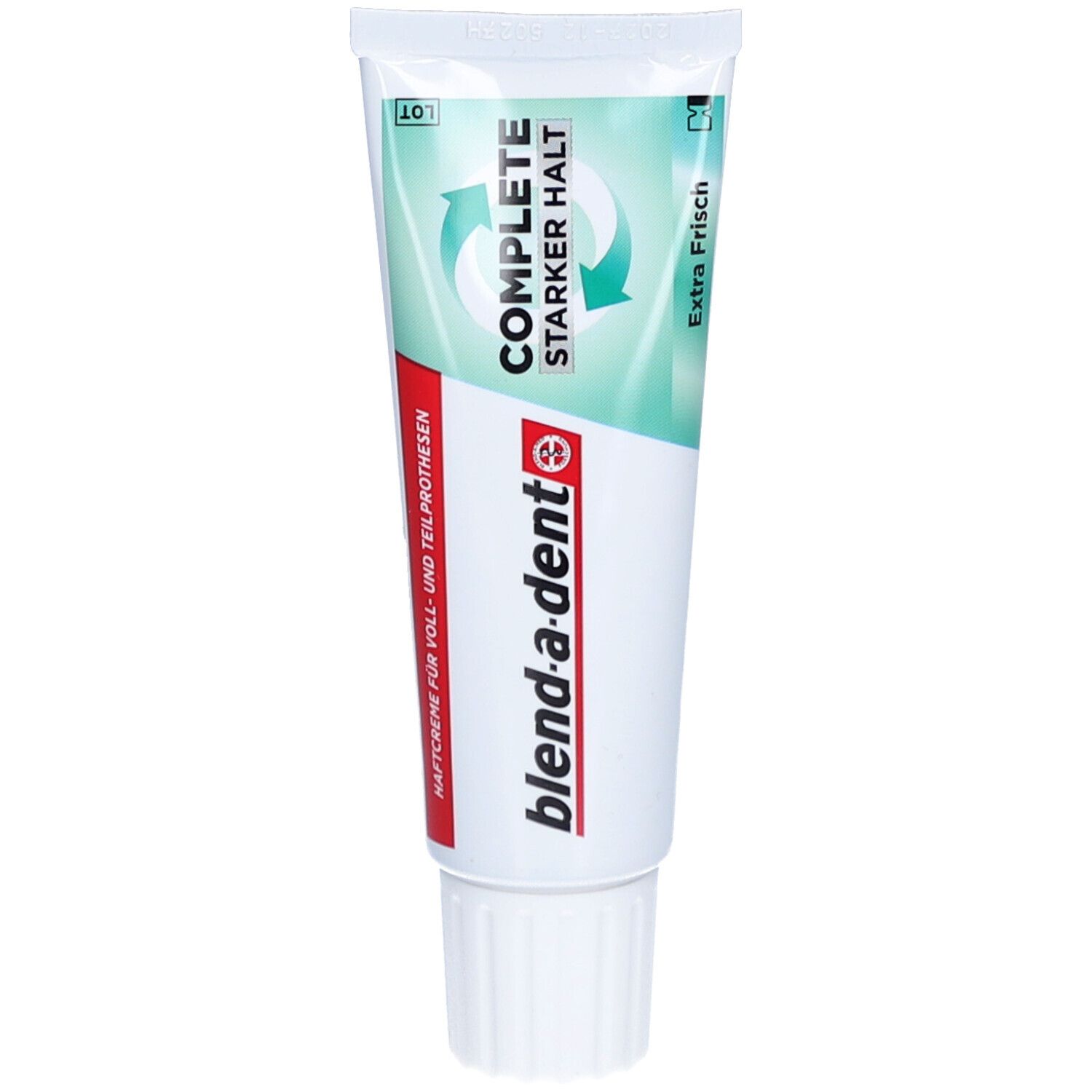 Zahnprothesen-Haftcreme-Tube. Weiß, mit grün-roter Beschriftung. Marke: blend-a-dent. Aufschrift: COMPLETE, Extra Frisch, Starker Halt.