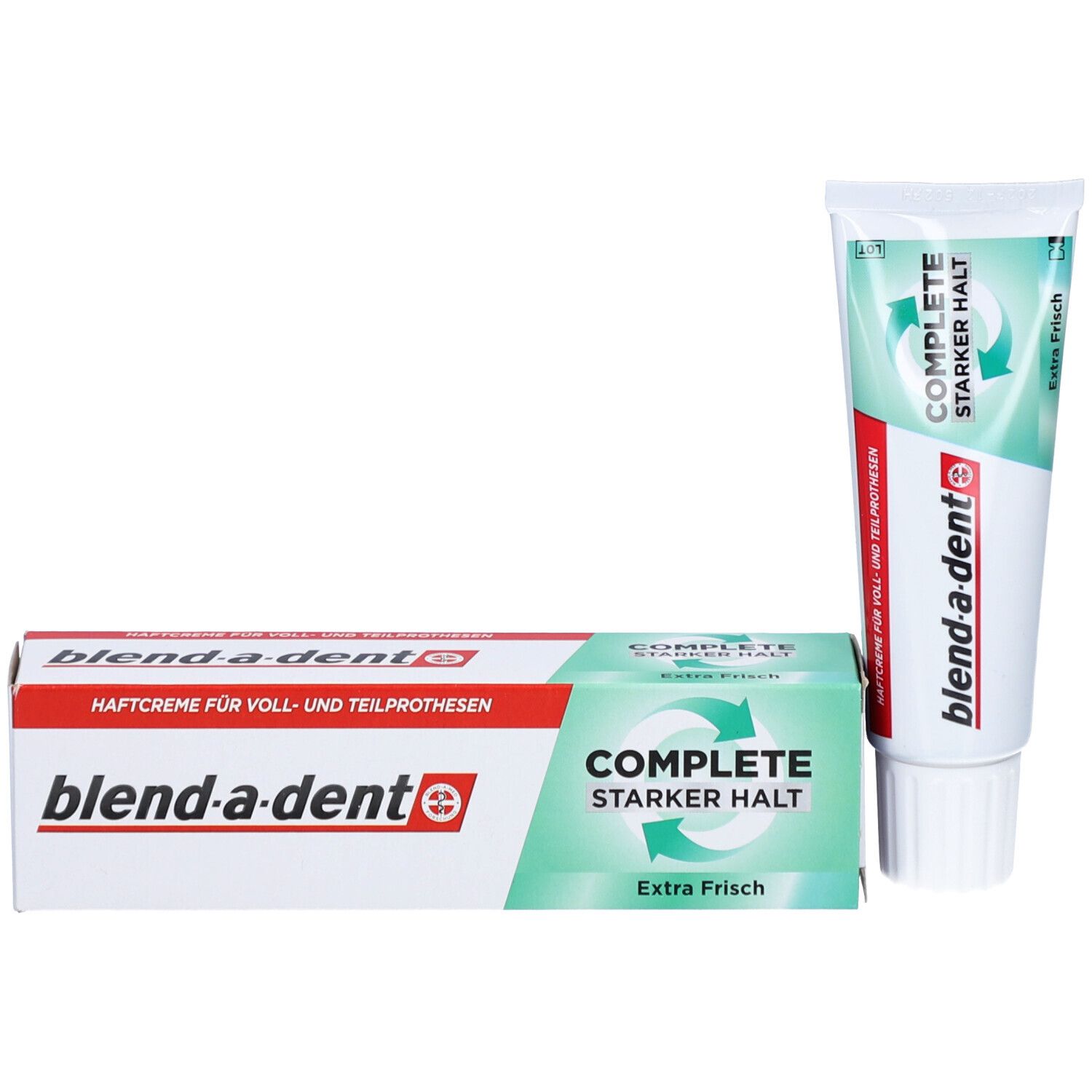 Zahnprothesen-Haftcreme-Tube und -Schachtel. Weiß, grün-rot. Marke: blend-a-dent. Aufschrift: COMPLETE, Extra Frisch, Starker Halt. Schachtel daneben.