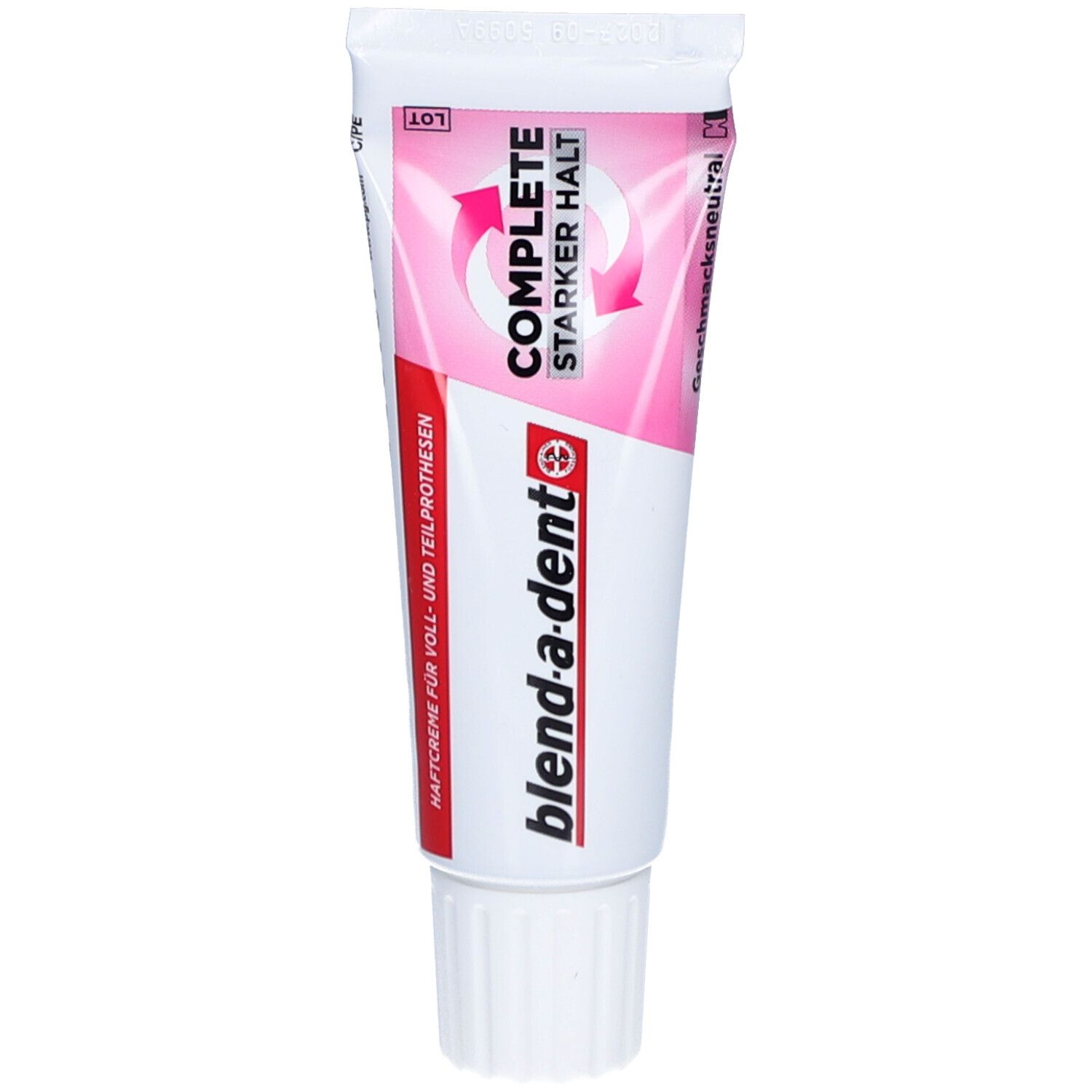 Zahncreme-Tube mit "blend-a-dent"-Logo und "COMPLETE Starker Halt". Rosa-weiße Farbgebung. Geschmacksneutral.