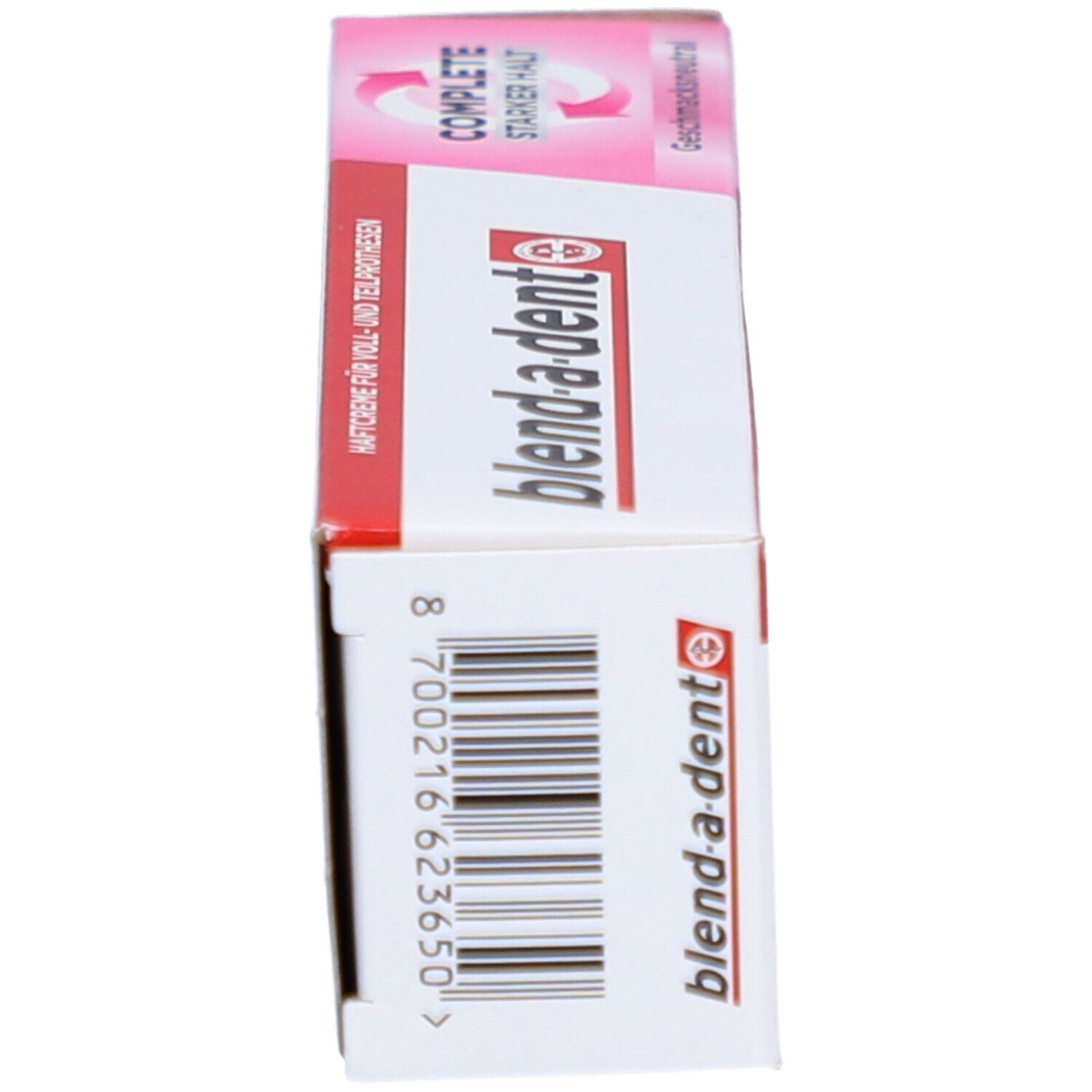 Seitenansicht der Verpackung von "blend-a-dent COMPLETE". Barcode und Produktinformationen. Rosa-weißes Design.