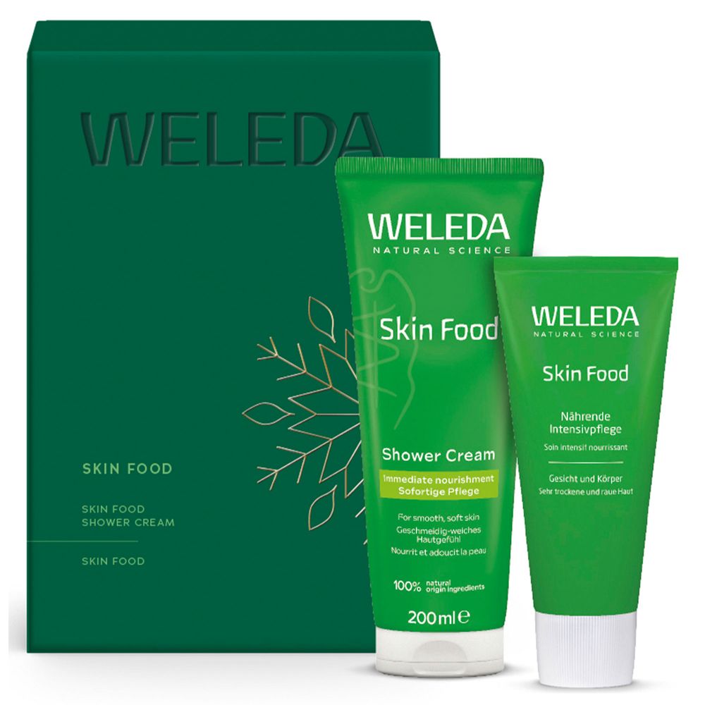 Grünes Geschenkset mit zwei Tuben und einer Schachtel. Aufdruck: WELEDA, Skin Food, Shower Cream.