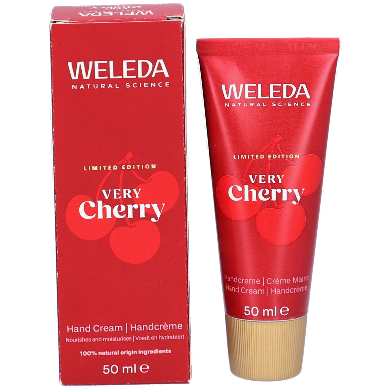 Rote Schachtel und Tube WELEDA Very Cherry Handcreme. Kirschabbildung. 50 ml. Handcreme.