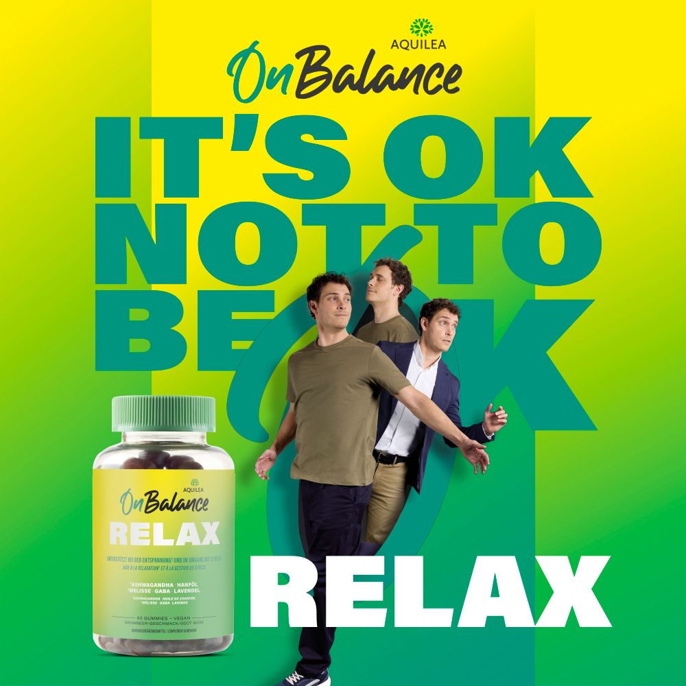 Werbebild mit 'OnBalance RELAX' Flasche. Text: 'IT'S OK NOT TO BE OK'. Drei Männer im Hintergrund.