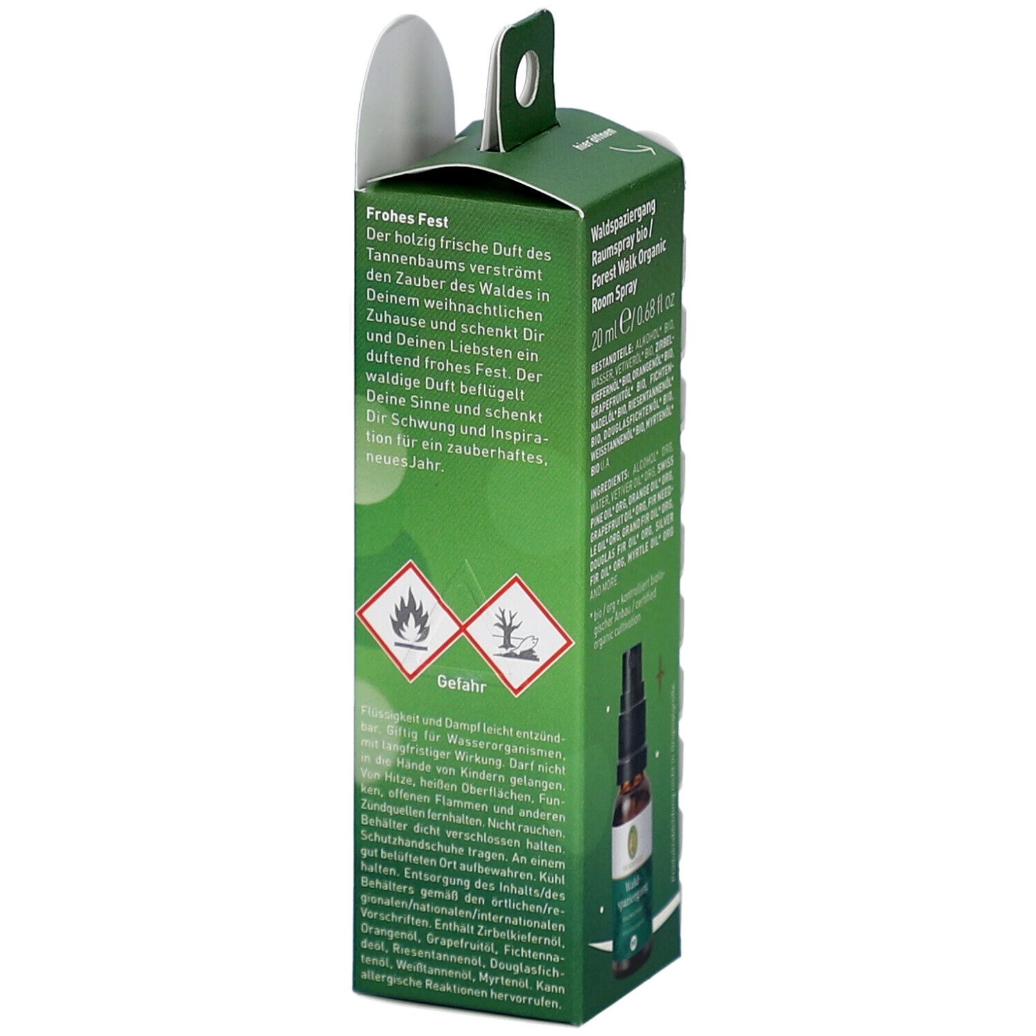 Grüne Verpackung mit Text über den Duft. Gefahrensymbole und Raumspray-Fläschchen. Marke Primavera.