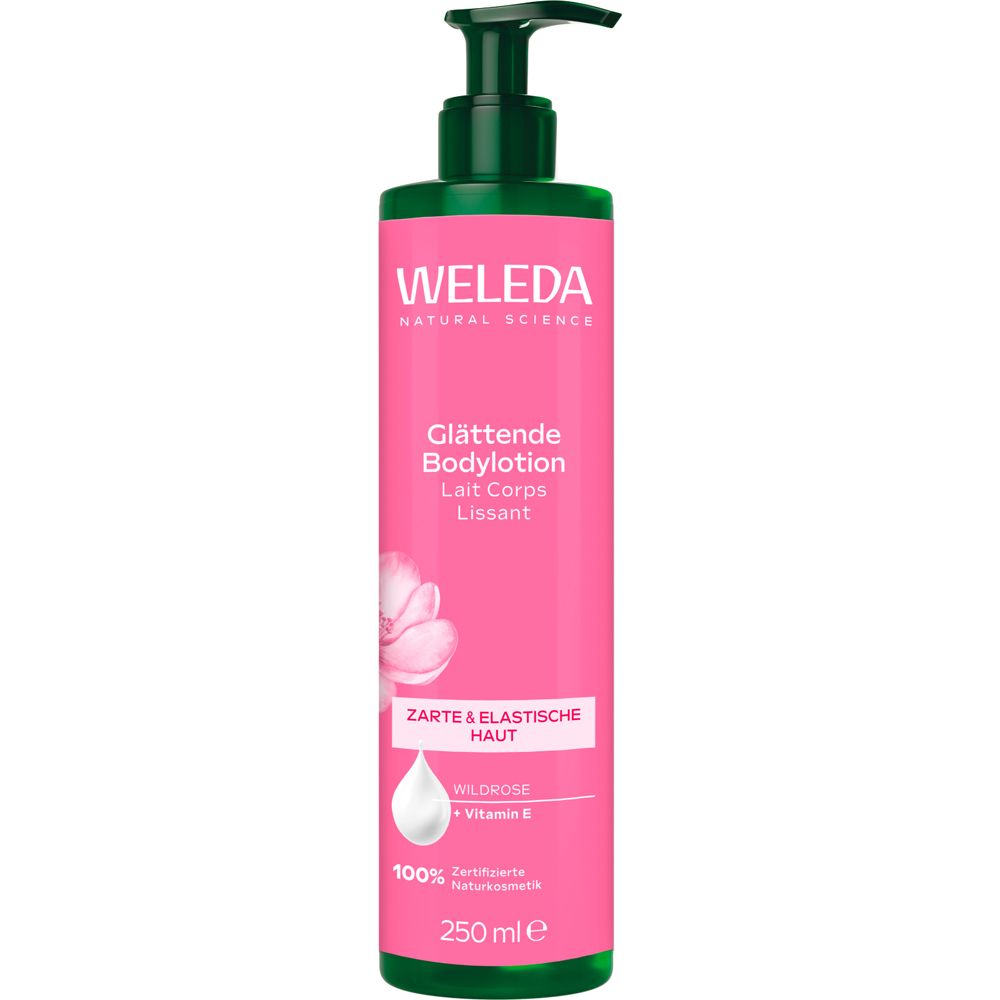 Weleda Bodylotion in rosa Flasche mit grünem Pumpkopf. Text: Glättende Bodylotion, Wildrose + Vitamin E. 250 ml.