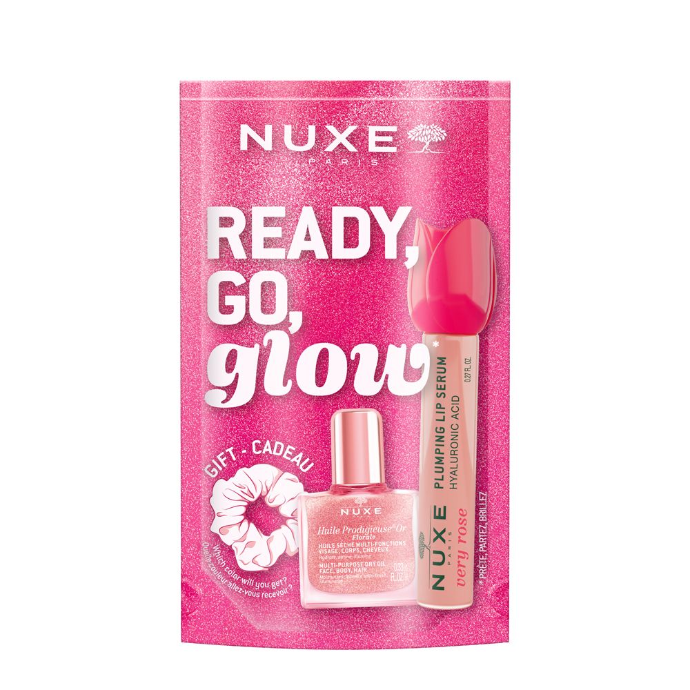 Rosa Geschenkset mit NUXE Produkten. Enthält Lip Serum, Nagellack und Haargummi. Text: Ready, Go, Glow.