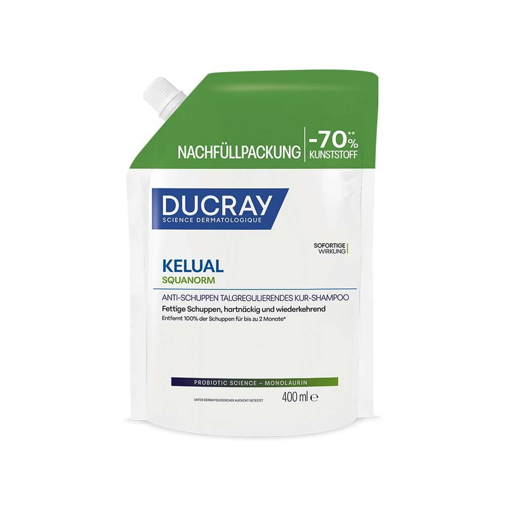 Nachfüllpackung. DUCRAY KELUAL SQUANORM Shampoo. Grüne und weiße Verpackung. Text: -70% Kunststoff.