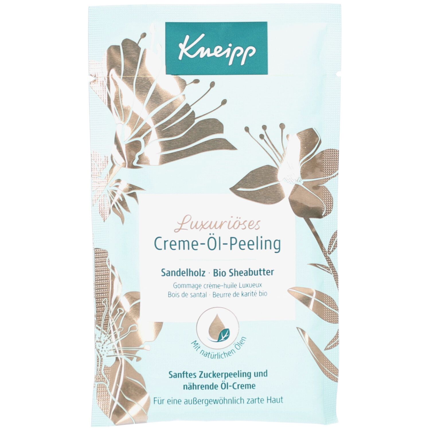 Kneipp Luxuriöses Creme-Öl-Peeling Sachet mit Blumenmuster. Enthält Sandelholz und Bio Sheabutter.