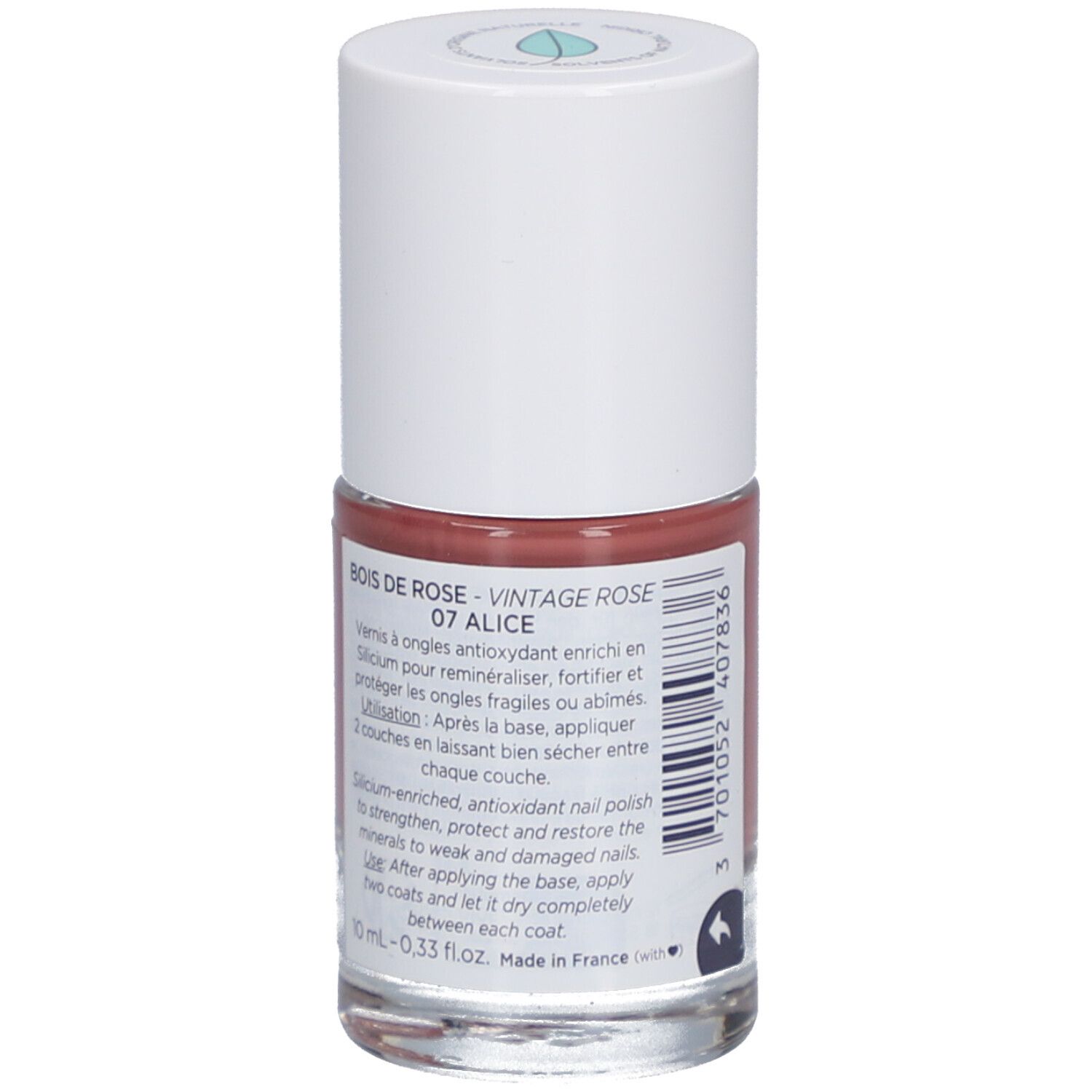 Nagellackflasche, rosafarbener Inhalt. Weißer Deckel. Text auf der Rückseite: Bois de Rose - Vintage Rose 07 Alice.