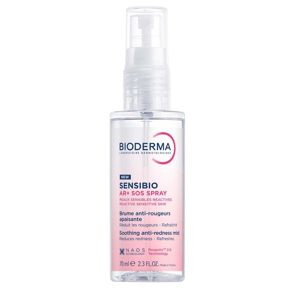 Transparente Sprühflasche mit weißem Sprühkopf. Etikett mit Produktnamen und Logo. 70ml.