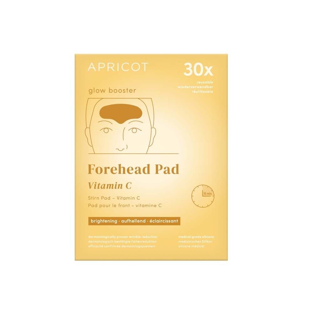 Gelbe Verpackung mit Stirn Pad. Text: APRICOT, Forehead Pad, Vitamin C, 30x. Illustration eines Gesichts.
