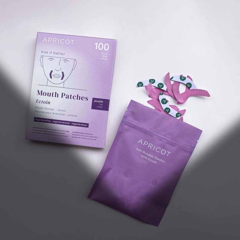 APRICOT Mund Patches mit Ectoin. Verpackung und Beutel mit Patches. Aufschrift: Anti-Wrinkle Patches.