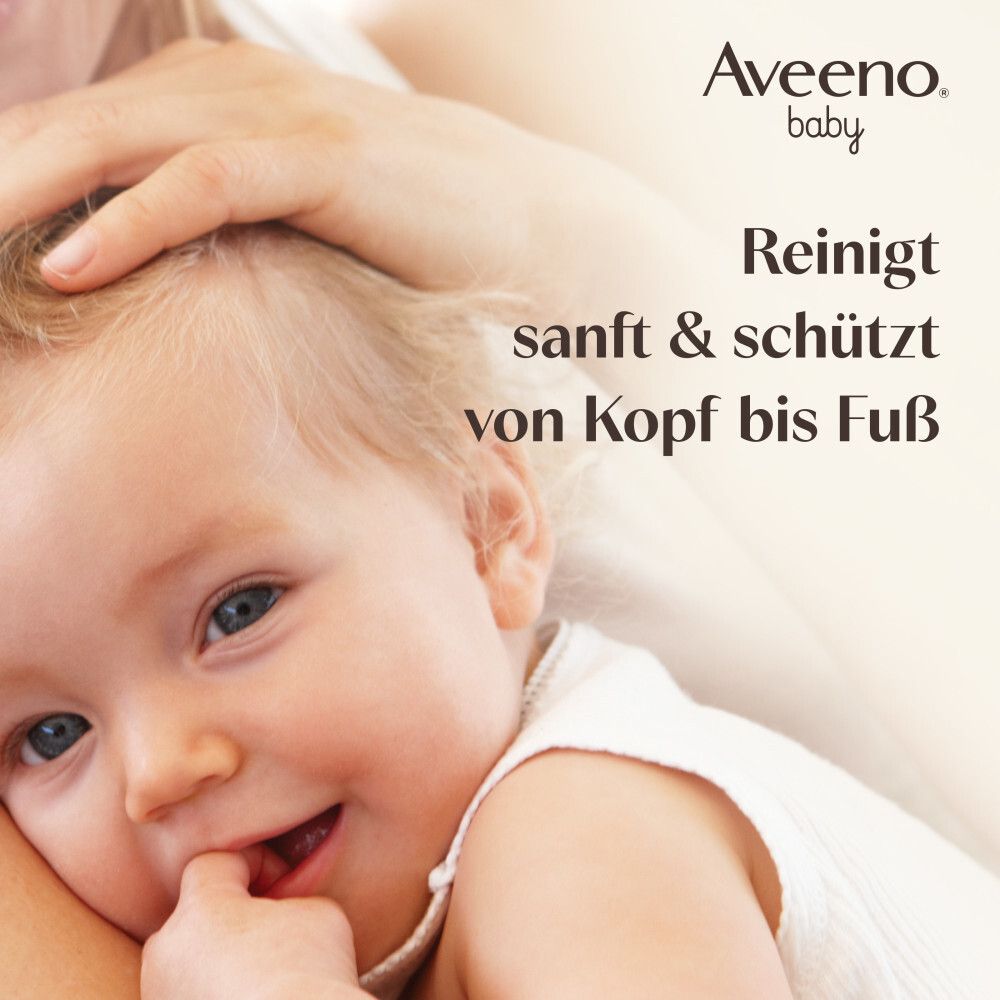 Baby wird von einer Hand am Kopf gehalten. Text: Reinigt sanft & schützt von Kopf bis Fuß. Aveeno Baby Logo.