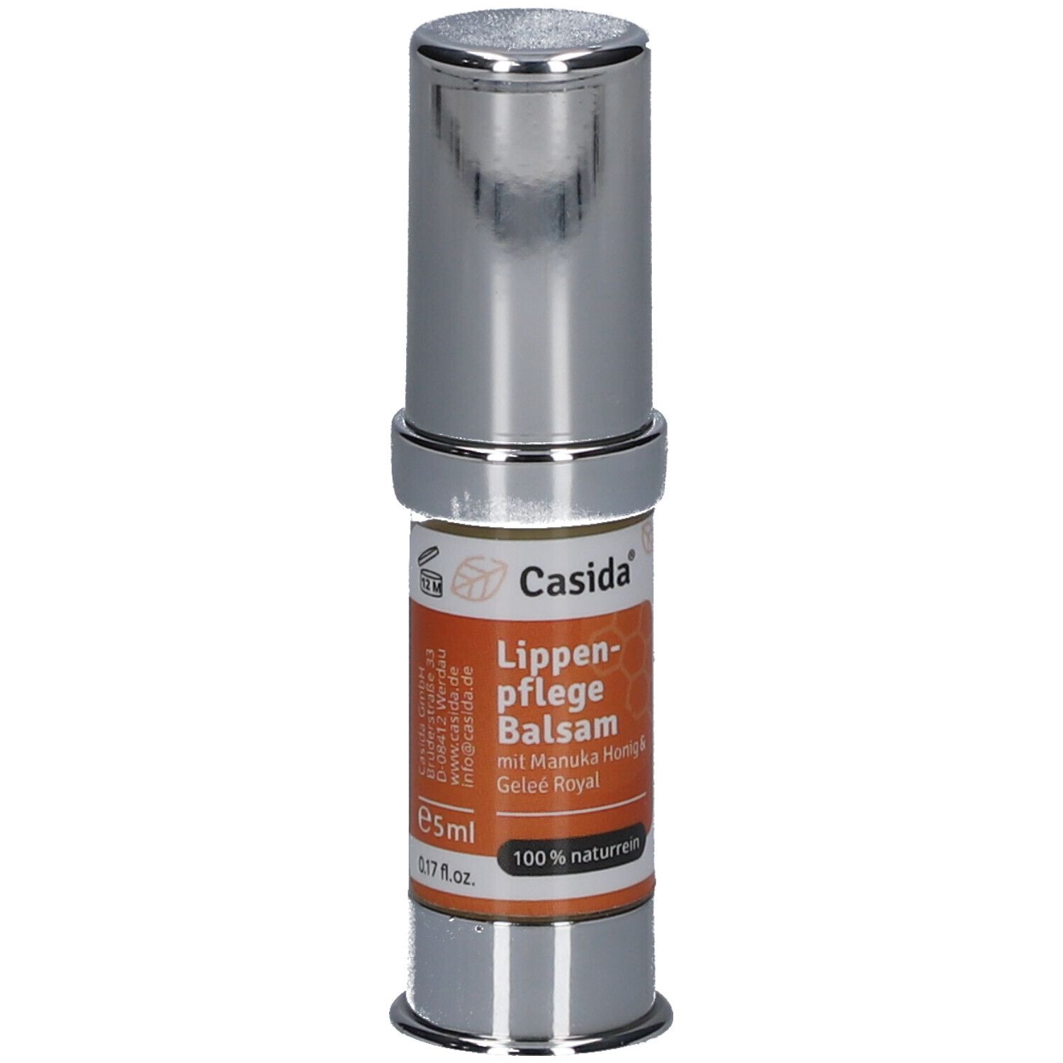 Lippenpflege Balsam mit Manuka Honig & Gelee Royal. Zylinderförmige Verpackung, silberfarben mit orangefarbenem Etikett.