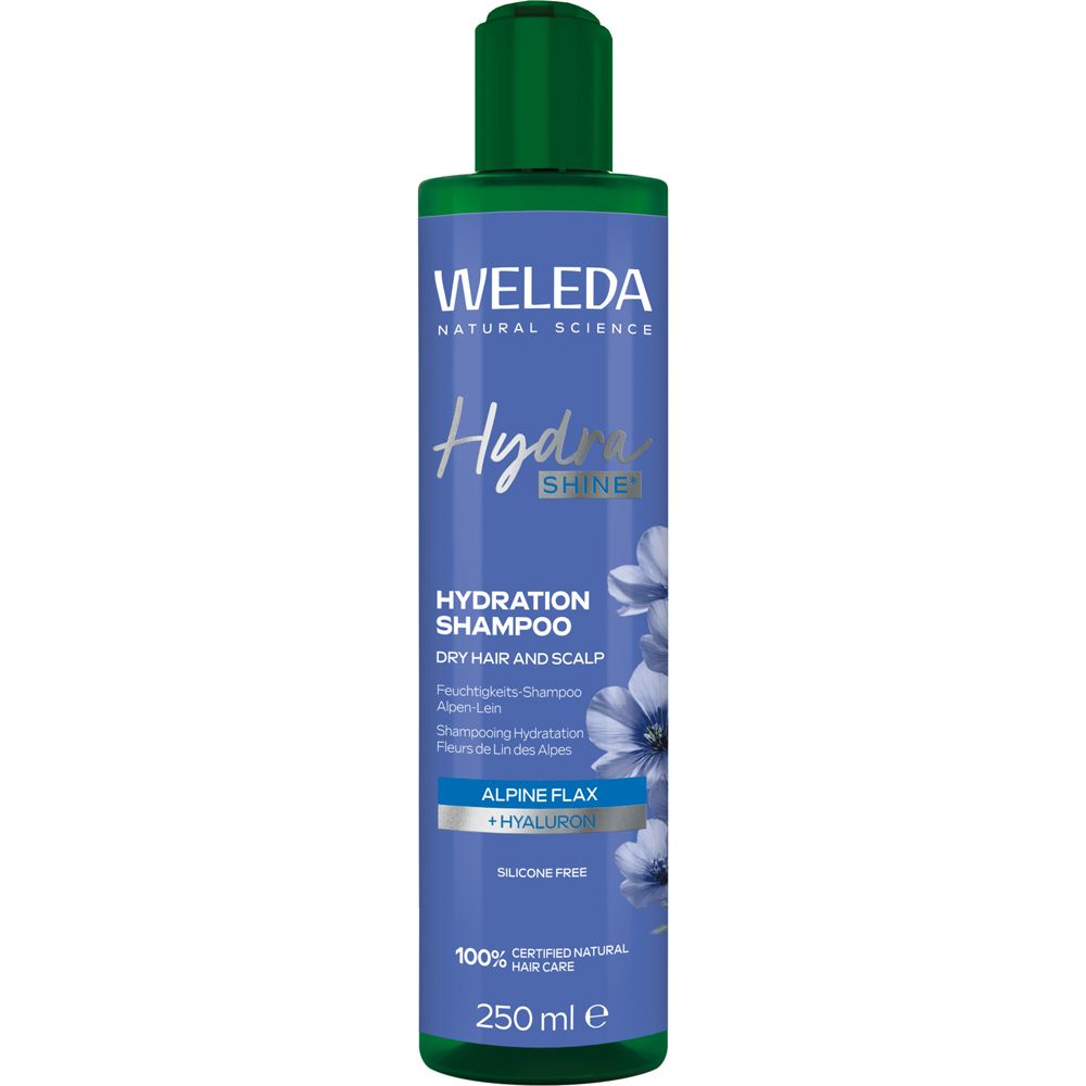 Weleda Hydra Shine Shampoo. Flasche mit grünem Deckel. Blaue Etikett mit Produktinformationen und Blumen. 250 ml.