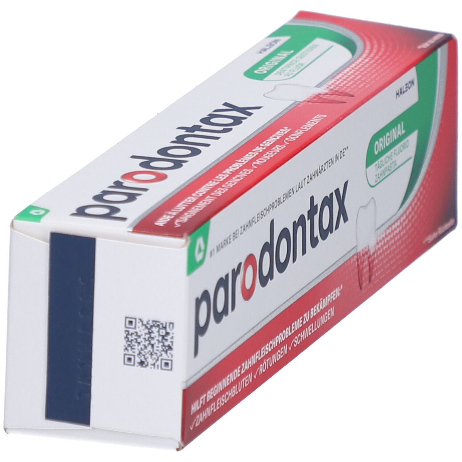 Schräg gestellte Zahnpasta-Verpackung mit rotem und grünem Design. Der Markenname ist sichtbar.