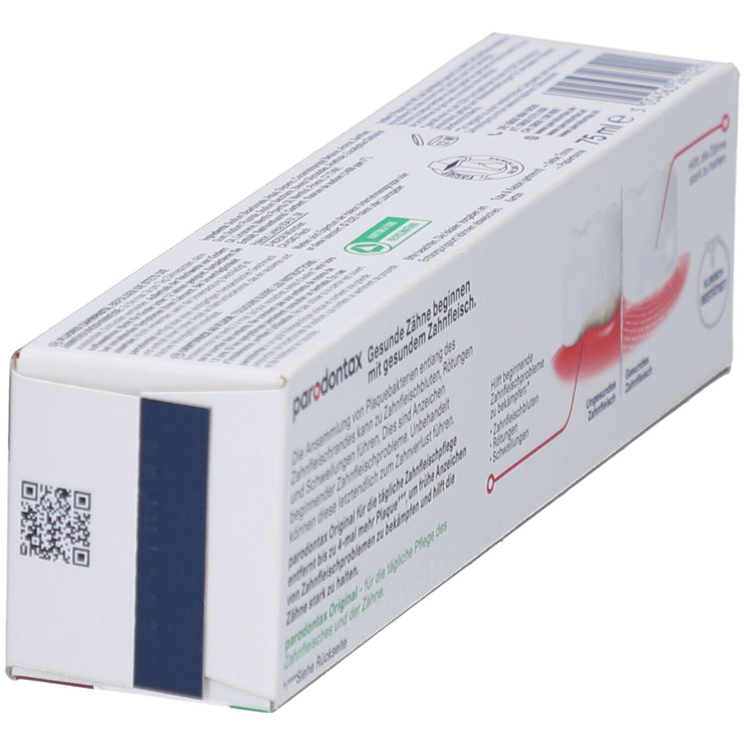 Schräg gestellte Zahnpasta-Verpackung, Rückseite mit Text und grafischer Darstellung von Zähnen.