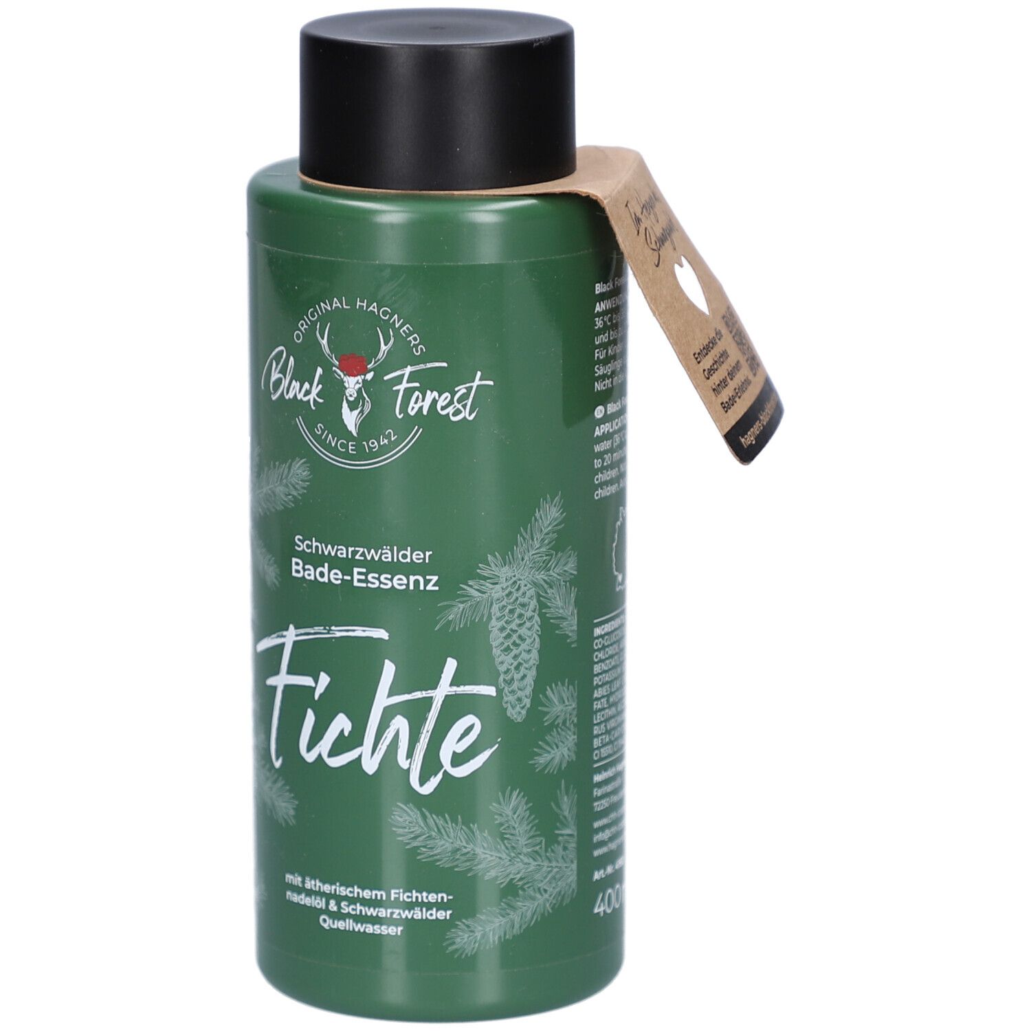 Grüne Flasche mit schwarzem Deckel und Anhänger. Aufschrift: Original Hagners Black Forest, Fichte, Bade-Essenz. Tannenzweige und Zapfen.