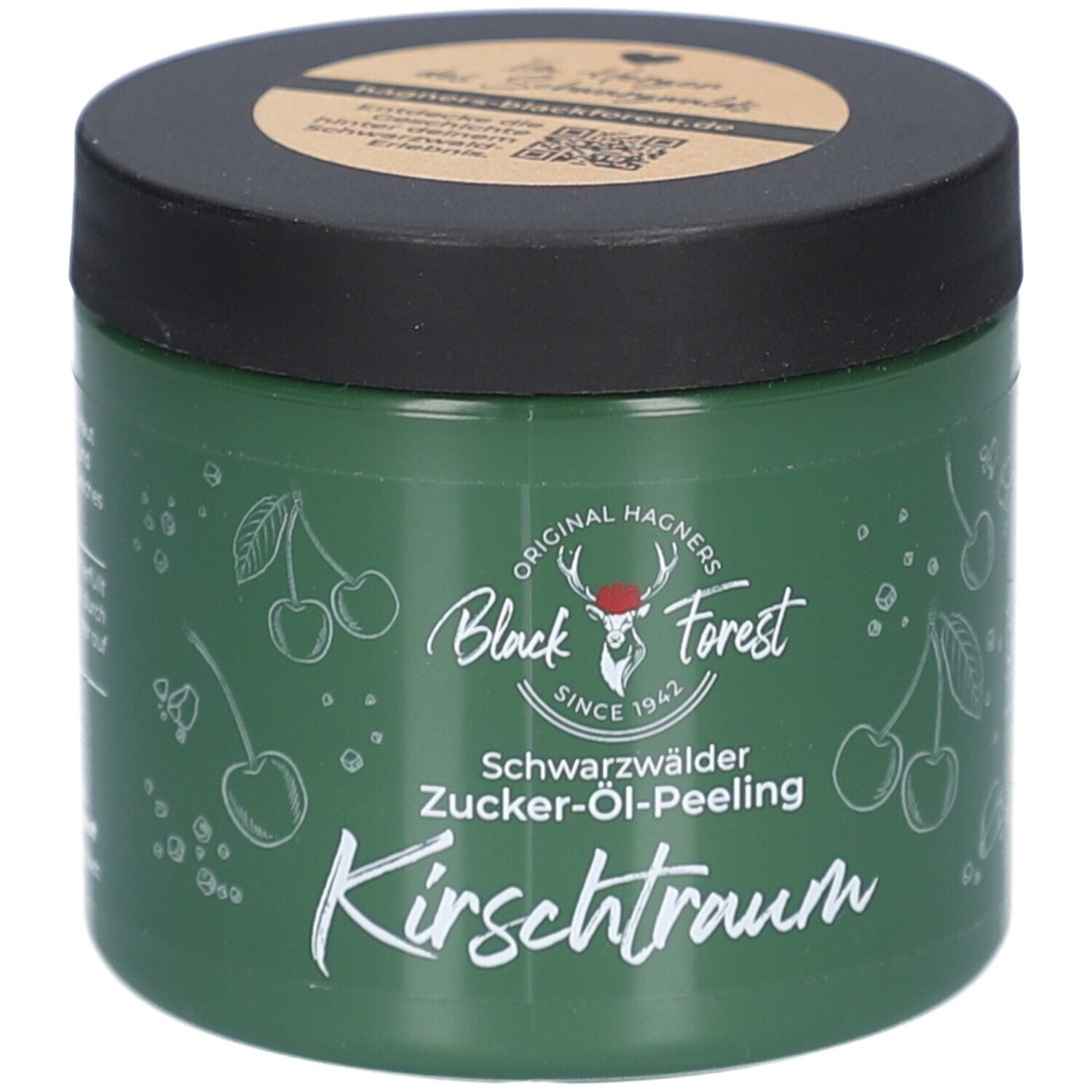 Grünes Tiegel mit schwarzem Deckel. Aufschrift: Original Hagners Black Forest, Schwarzwälder Zucker-Öl-Peeling Kirschtraum. Kirsch-Illustrationen.
